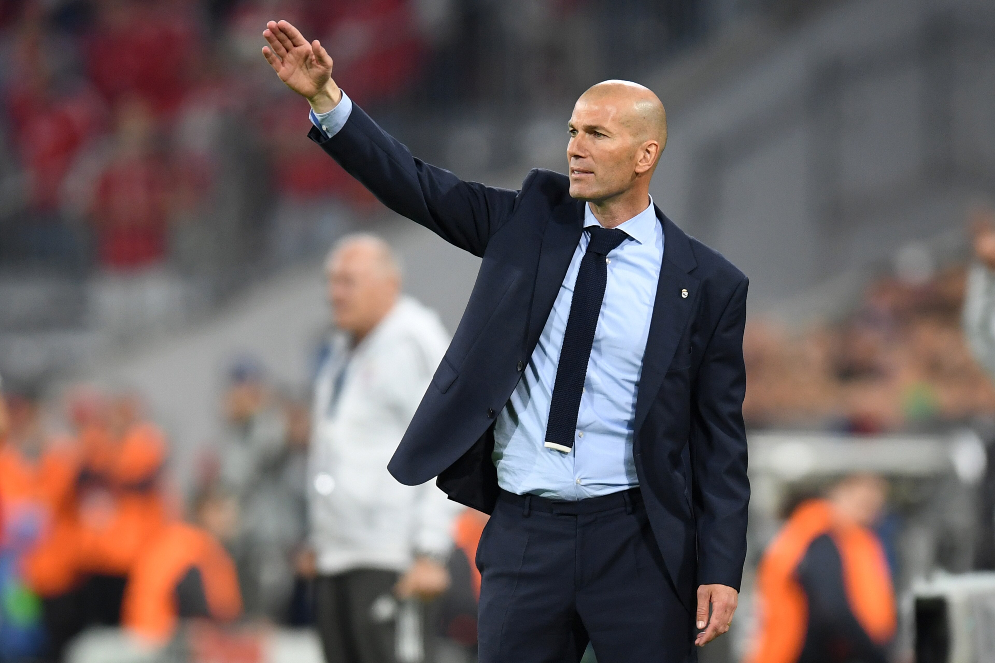 Real Madrid's French coach Zinedine Zidane reacts during the UEFA Champions League semi-final first-leg football match FC Bayern Munich v Real Madrid CF in Munich in southern Germany on April 25, 2018. (Photo by Christof STACHE / AFP)        (Photo credit