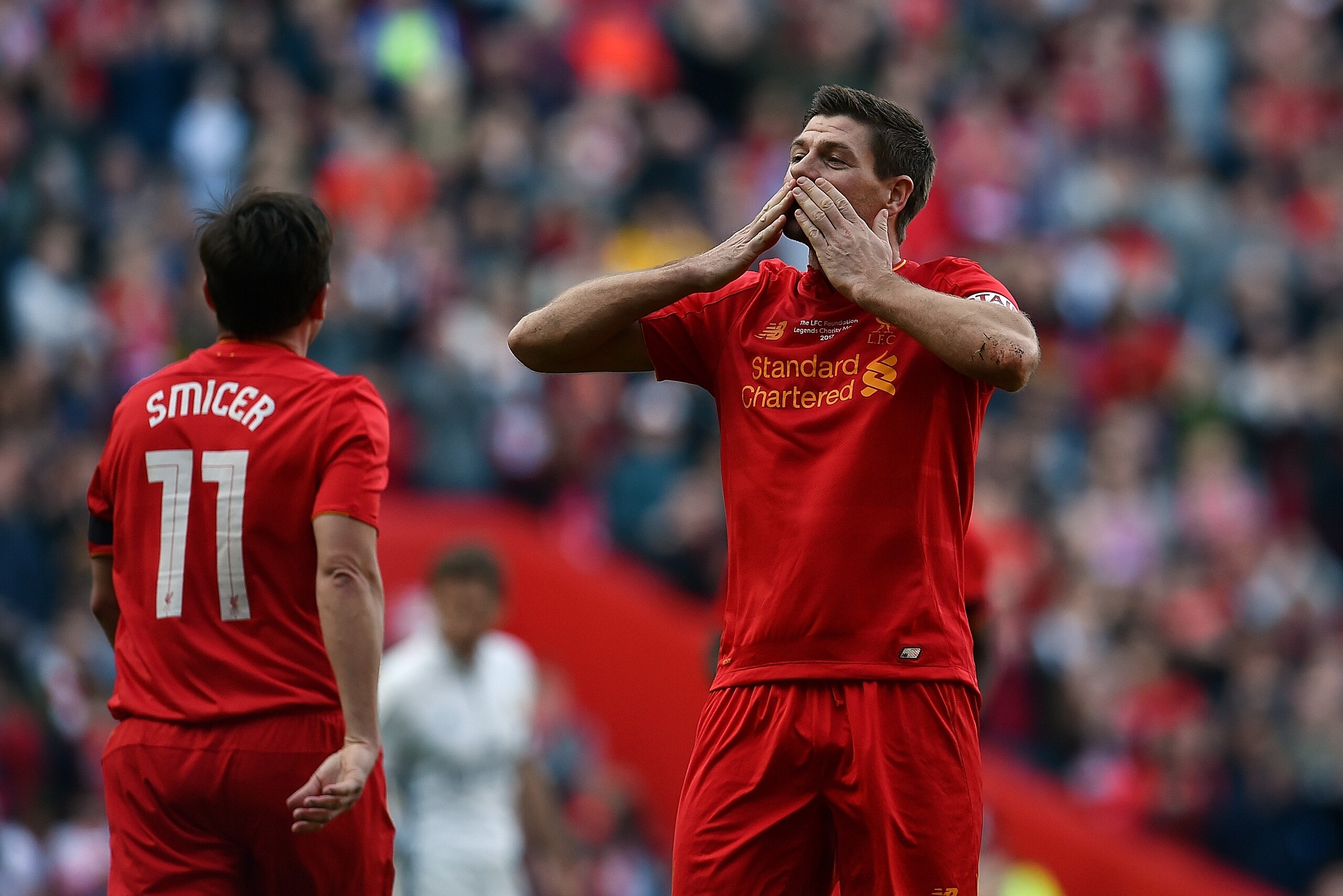 LIVERPOOL, ENGLAND - MARCH 25: (THE SUN OUT, THE SUN ON SUNDAY OUT) Steven Gerrard of Liverpool Legends celebrates after scoring the winner during the LFC Foundation Charity Match between Liverpool Legends and Real Madrid Legends at Anfield on March 25 in