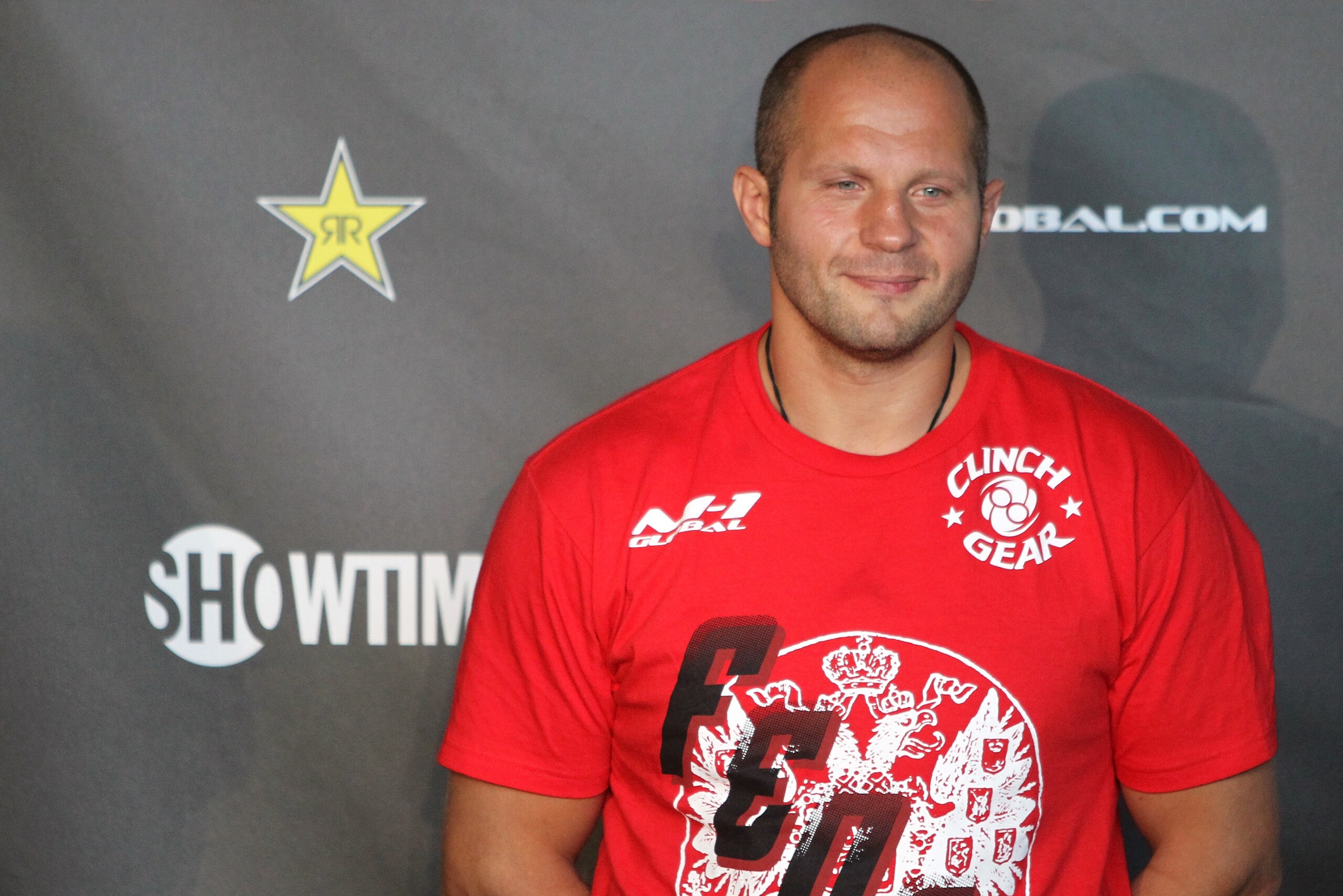 HOFFMAN ESTATES, IL - JULY 29:  Fedor Emelianenko stands on stage at the Strikeforce: Fedor vs. Henderson weigh-in at Sears Centre Arena on July 29, 2011 in Hoffman Estates, Illinois.  (Photo by Josh Hedges/Forza LLC/Forza LLC via Getty Images)