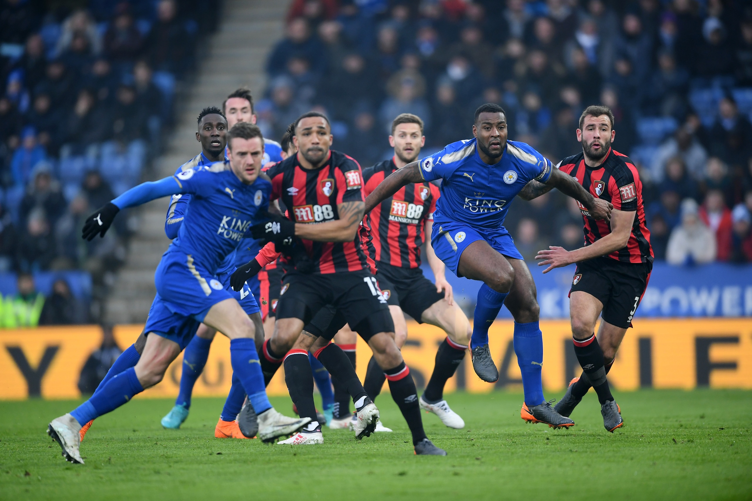 LEICESTER, ENGLAND - MARCH 03: Wes Morgan of Leicester battles for position at a corner with Steve Cook of Bornemouth during the Premier League match between Leicester City and AFC Bournemouth at The King Power Stadium on March 3, 2018 in Leicester, Engla