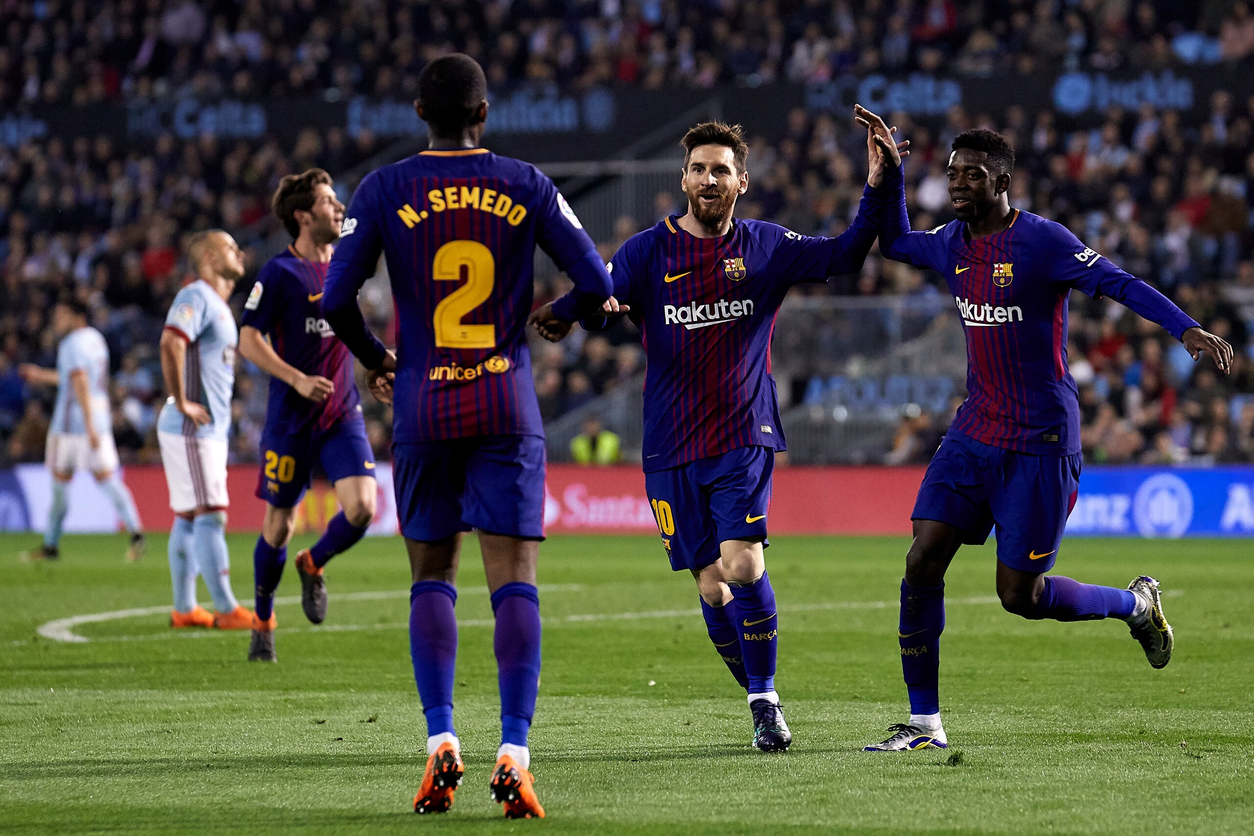 VIGO, SPAIN - APRIL 17:  Lionel Messi, Ousmane Dembele and Nelson Semedo of FC Barcelona celebrate the second goal during the La Liga match between Celta de Vigo and Barcelona at Balaidos Stadium on April 17, 2018 in Vigo, Spain.  (Photo by Quality Sport 