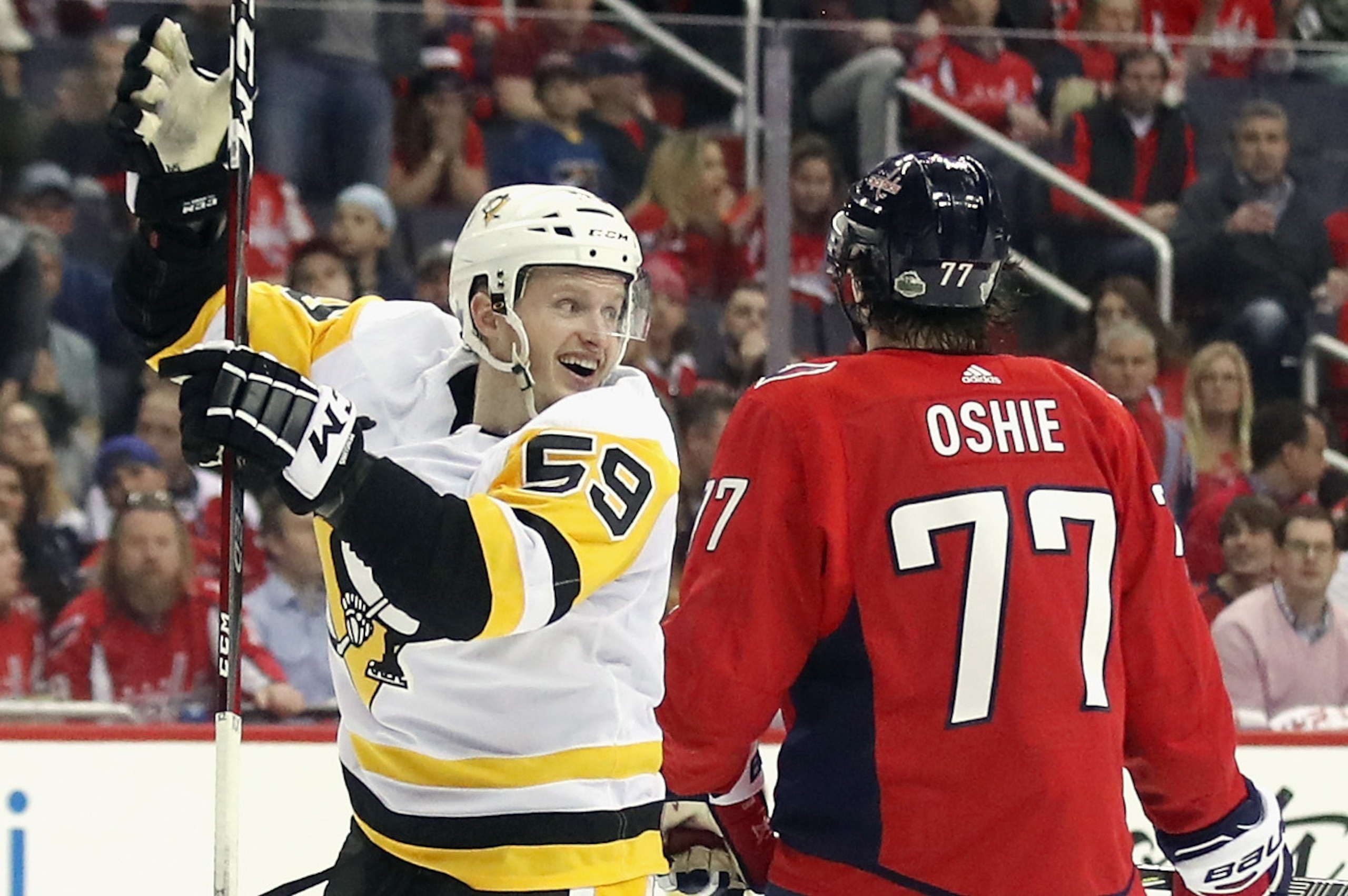 WASHINGTON, DC - APRIL 26:  Jake Guentzel #59 of the Pittsburgh Penguins celebrates his game winning goal at 7:48 of the third period against the Washington Capitals in Game One of the Eastern Conference Second Round during the 2018 NHL Stanley Cup Playof
