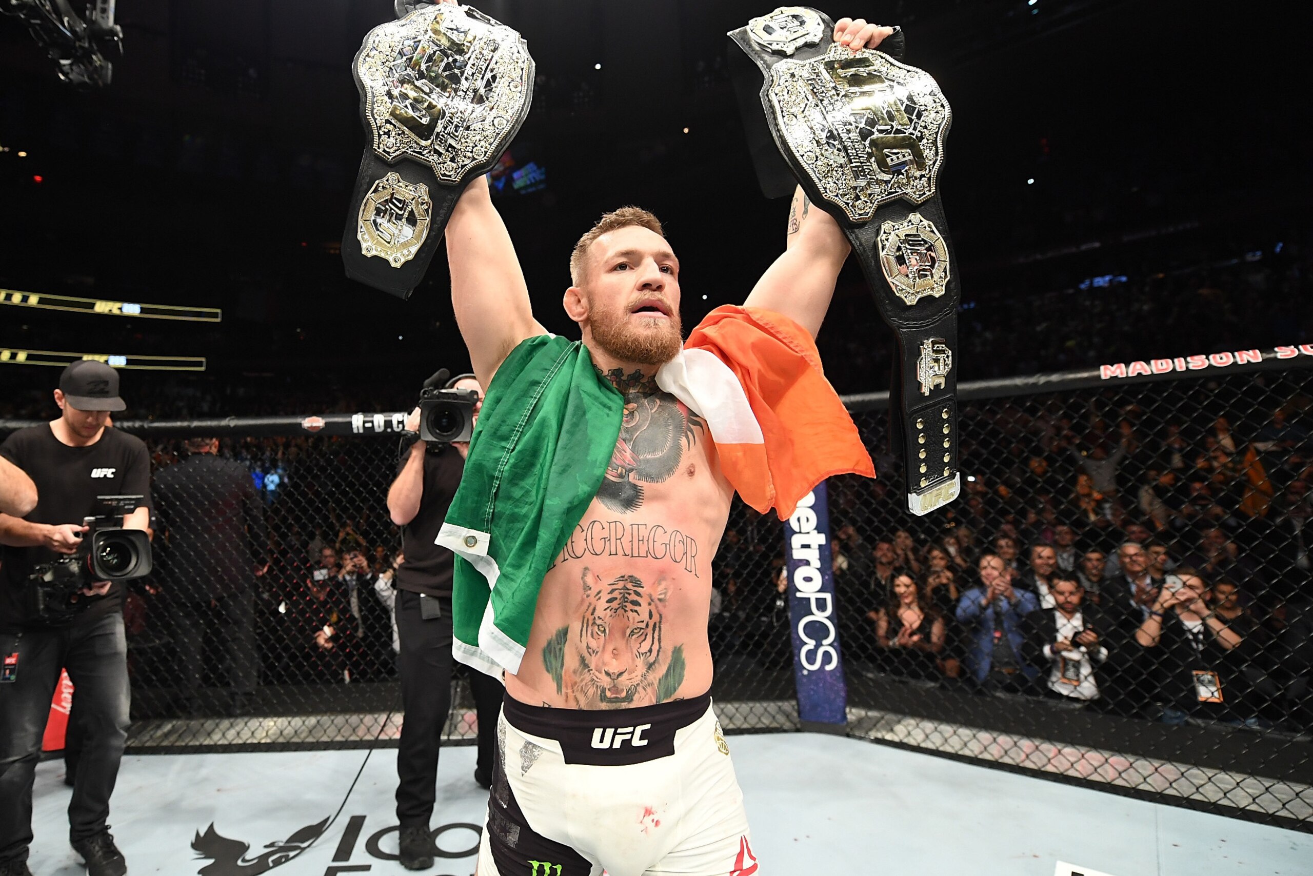NEW YORK, NY - NOVEMBER 12: UFC lightweight and featherweight champion Conor McGregor of Ireland celebrates after defeating Eddie Alvarez in their UFC lightweight championship fight during the UFC 205 event at Madison Square Garden on November 12, 2016 i NEW YORK, NY - NOVEMBER 12: UFC lightweight and featherweight champion Conor McGregor of Ireland celebrates after defeating Eddie Alvarez in their UFC lightweight championship fight during the UFC 205 event at Madison Square Garden on November 12, 2016 i