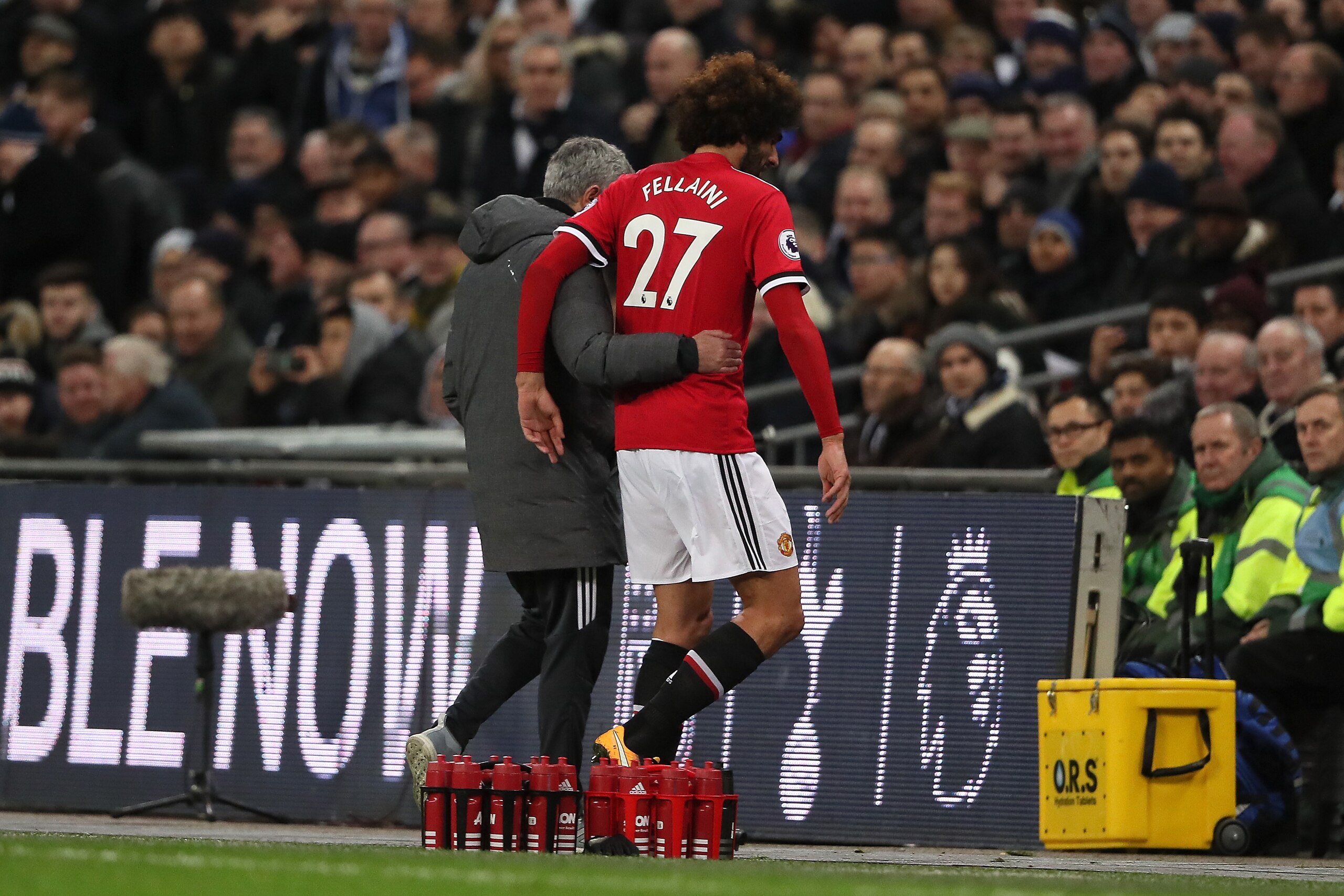 LONDON, ENGLAND - JANUARY 31:  Marouane Fellaini of Manchester United is substituted by Manchester United Head Coach / Manager Jose Mourinho after coming on as a substitute during the Premier League match between Tottenham Hotspur and Manchester United at