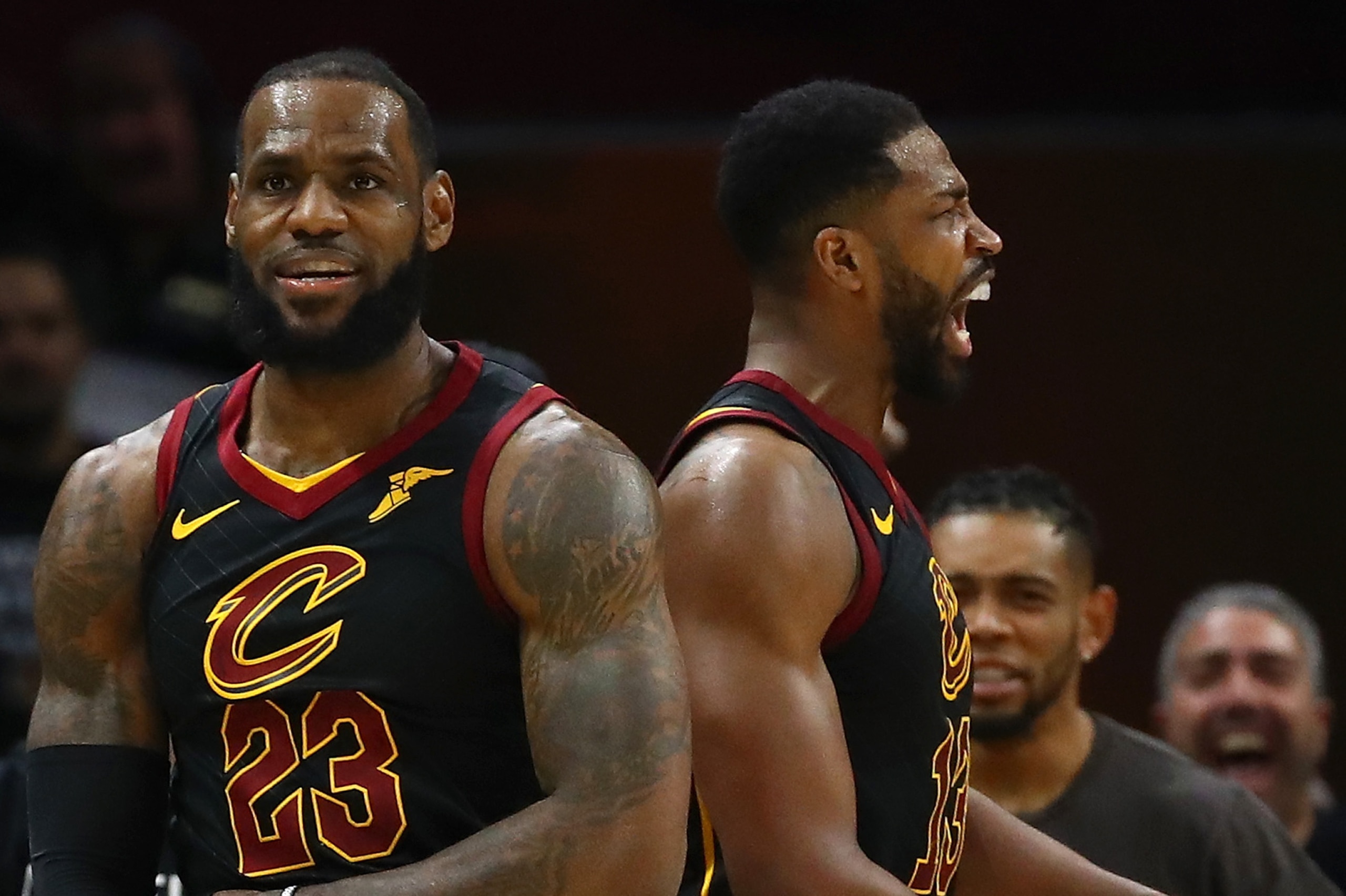 CLEVELAND, OH - APRIL 29: LeBron James #23 and Tristan Thompson #13 of the Cleveland Cavaliers react to a second half play while playing the Indiana Pacers in Game Seven of the Eastern Conference Quarterfinals during the 2018 NBA Playoffs at Quicken Loans
