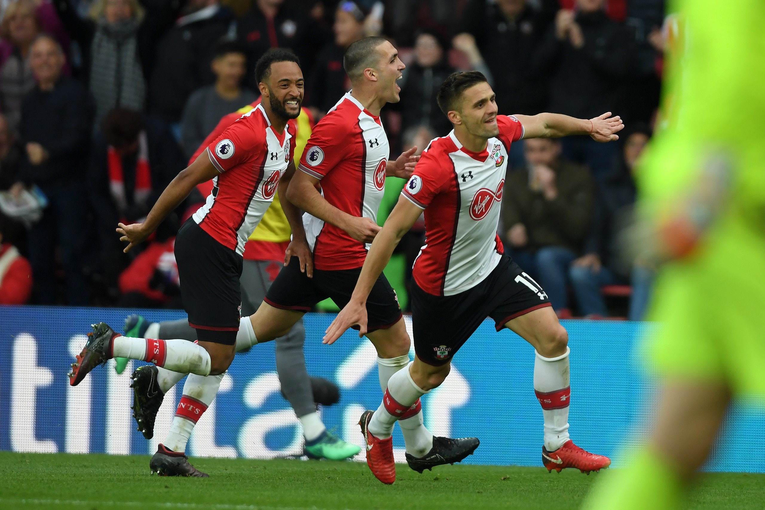 SOUTHAMPTON, ENGLAND - APRIL 28:  Dusan Tadic of Southampton celebrates scoring his side's second goal with Nathan Redmond and Oriol Romeu during the Premier League match between Southampton and AFC Bournemouth at St Mary's Stadium on April 28, 2018 in So