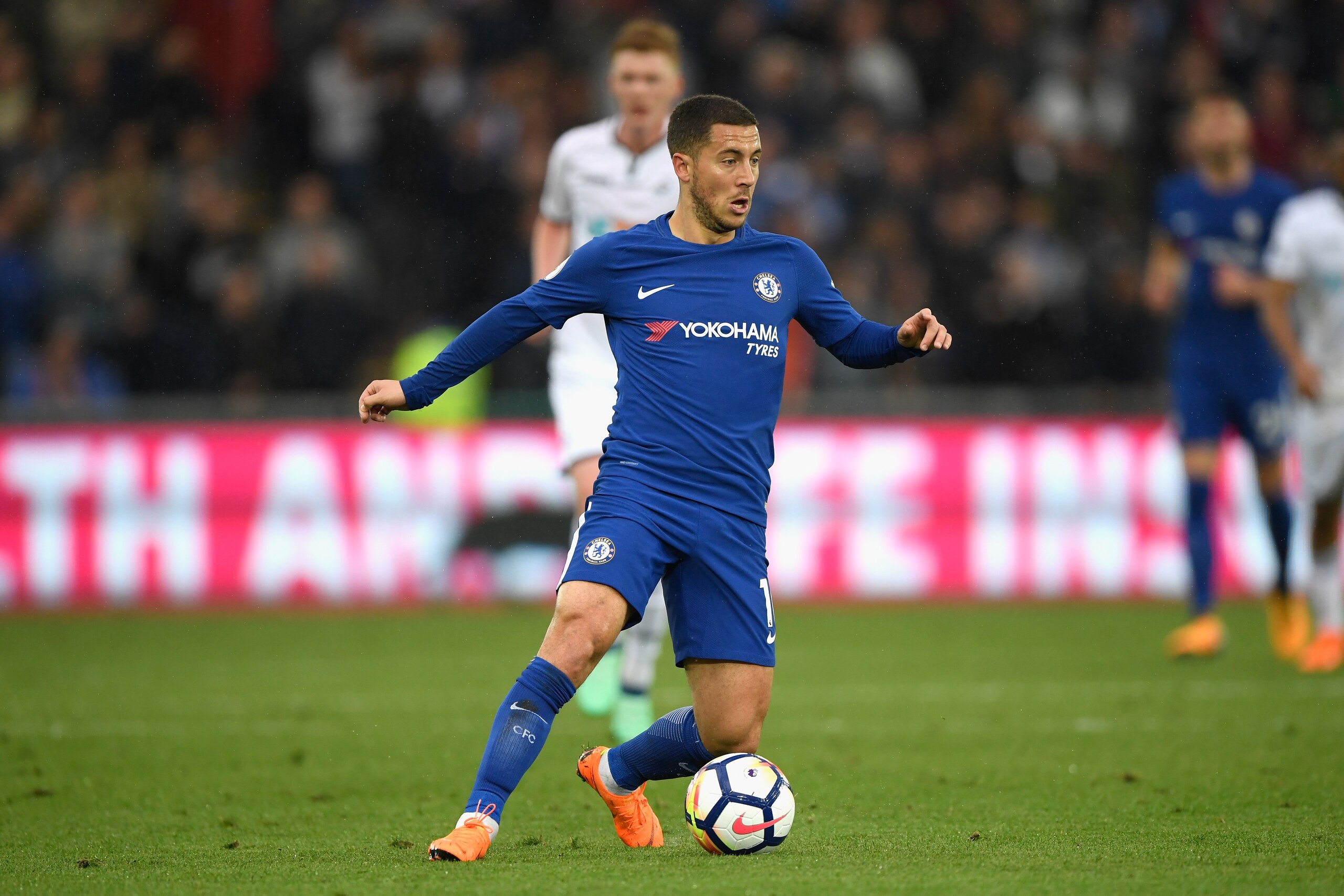 SWANSEA, WALES - APRIL 28:  Chelsea player Eden Hazard in action during the Premier League match between Swansea City and Chelsea at Liberty Stadium on April 28, 2018 in Swansea, Wales.  (Photo by Stu Forster/Getty Images)