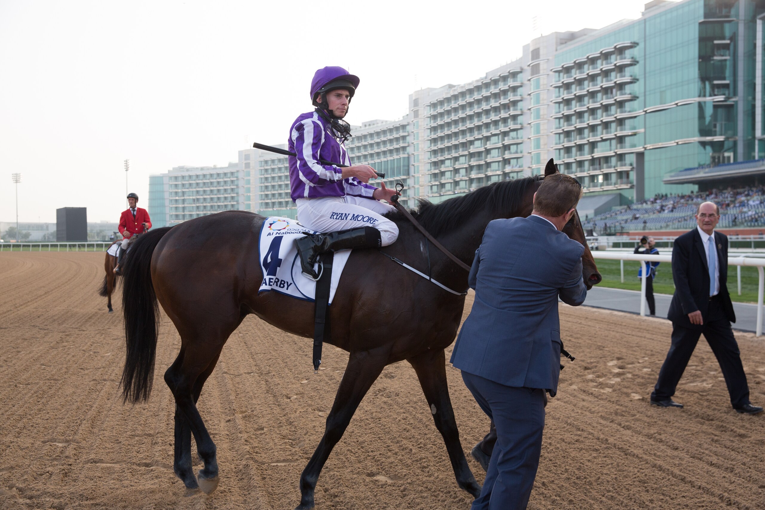 DUBAI, UNITED ARAB EMIRATES - MARCH 31: Ryan Moore riding Mendelssohn wins the UAE Derby during the Dubai World Cup Day at Meydan Racecourse on March 31, 2018 in Dubai, United Arab Emirates.