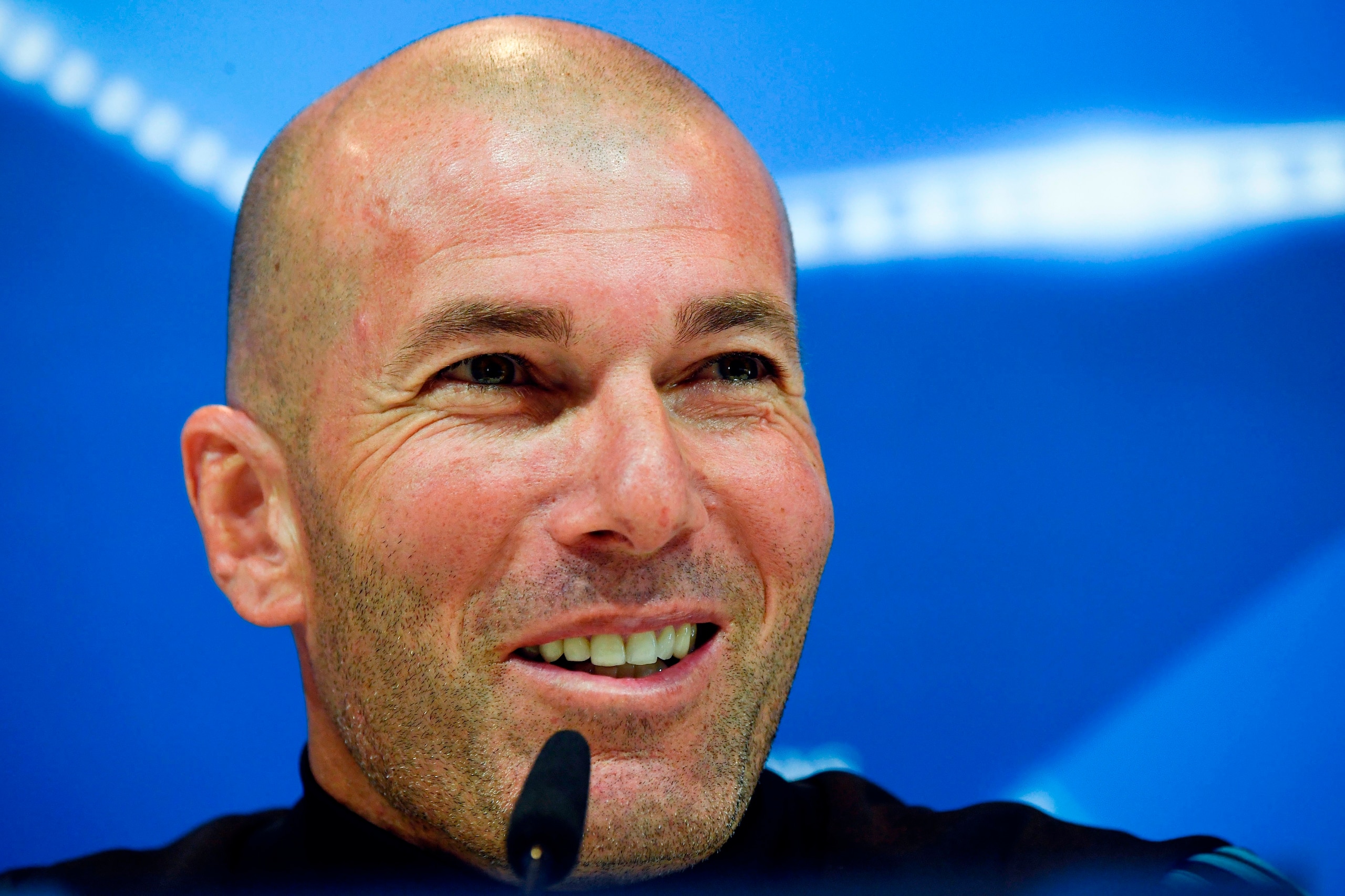 Real Madrid's French coach Zinedine Zidane holds a press conference at the Valdebebas training ground in Madrid on April 30, 2018 on the eve of the UEFA Champions League semi-final second-leg football match between Real Madrid and Bayern Munich. (Photo by