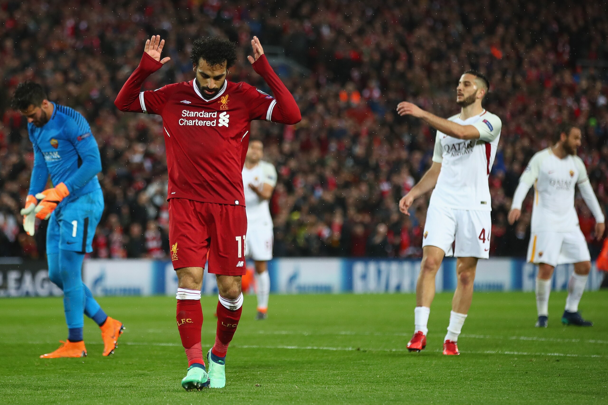 LIVERPOOL, ENGLAND - APRIL 24:  Mohamed Salah of Liverpool celebrates scoring his second goal during the UEFA Champions League Semi Final First Leg match between Liverpool and A.S. Roma at Anfield on April 24, 2018 in Liverpool, United Kingdom.  (Photo by