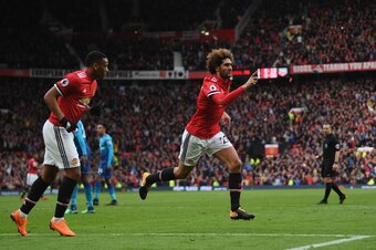 MANCHESTER, ENGLAND - APRIL 29:  Marouane Fellaini of Manchester United celebrates after scoring his sides second goal during the Premier League match between Manchester United and Arsenal at Old Trafford on April 29, 2018 in Manchester, England.  (Photo 