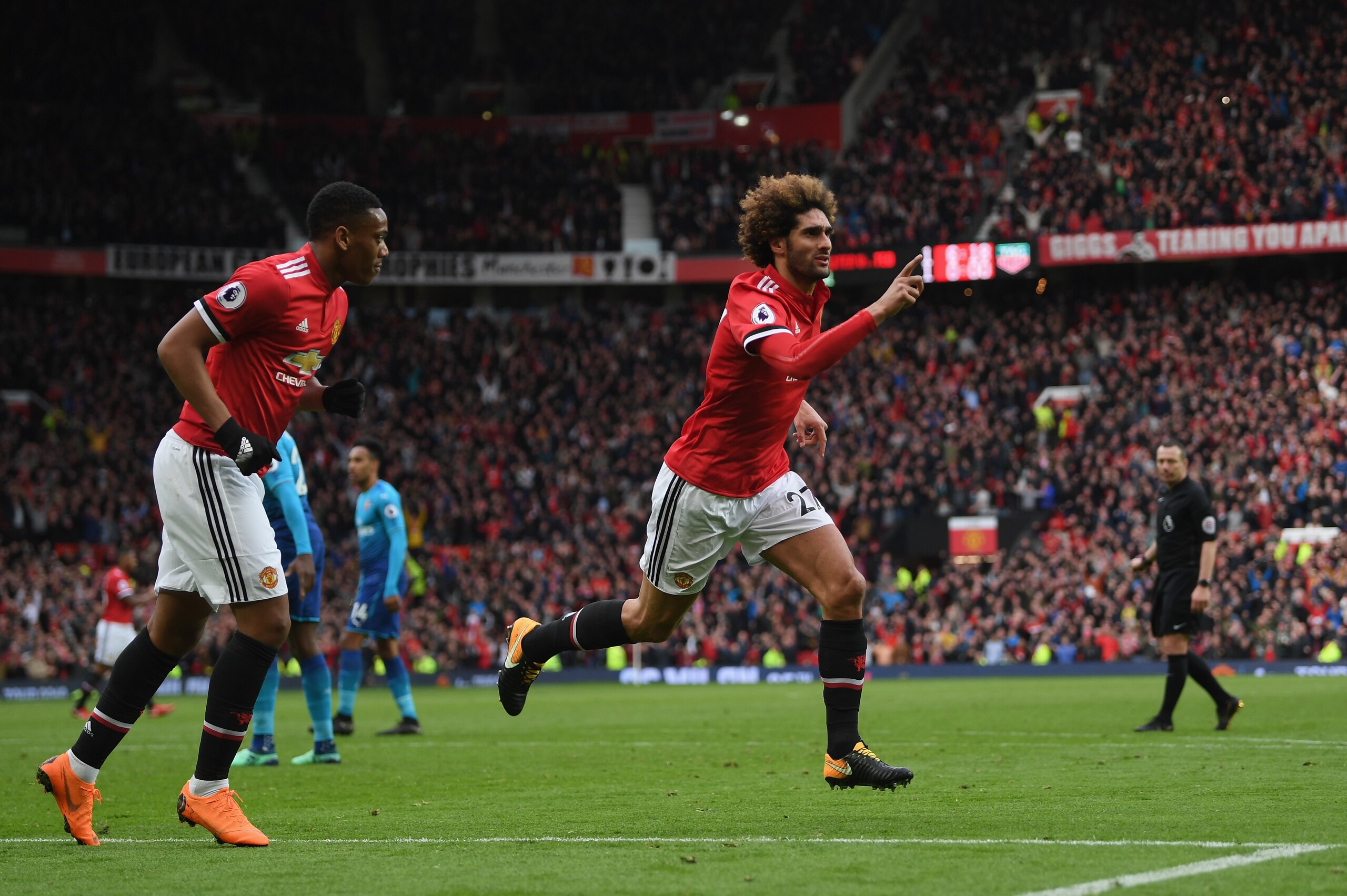 MANCHESTER, ENGLAND - APRIL 29:  Marouane Fellaini of Manchester United celebrates after scoring his sides second goal during the Premier League match between Manchester United and Arsenal at Old Trafford on April 29, 2018 in Manchester, England.  (Photo 