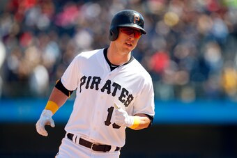 PITTSBURGH, PA - APRIL 26:  Corey Dickerson #12 of the Pittsburgh Pirates rounds second after hitting a walk off home run in the ninth inning against the Detroit Tigers during interleague play at PNC Park on April 26, 2018 in Pittsburgh, Pennsylvania.  (P