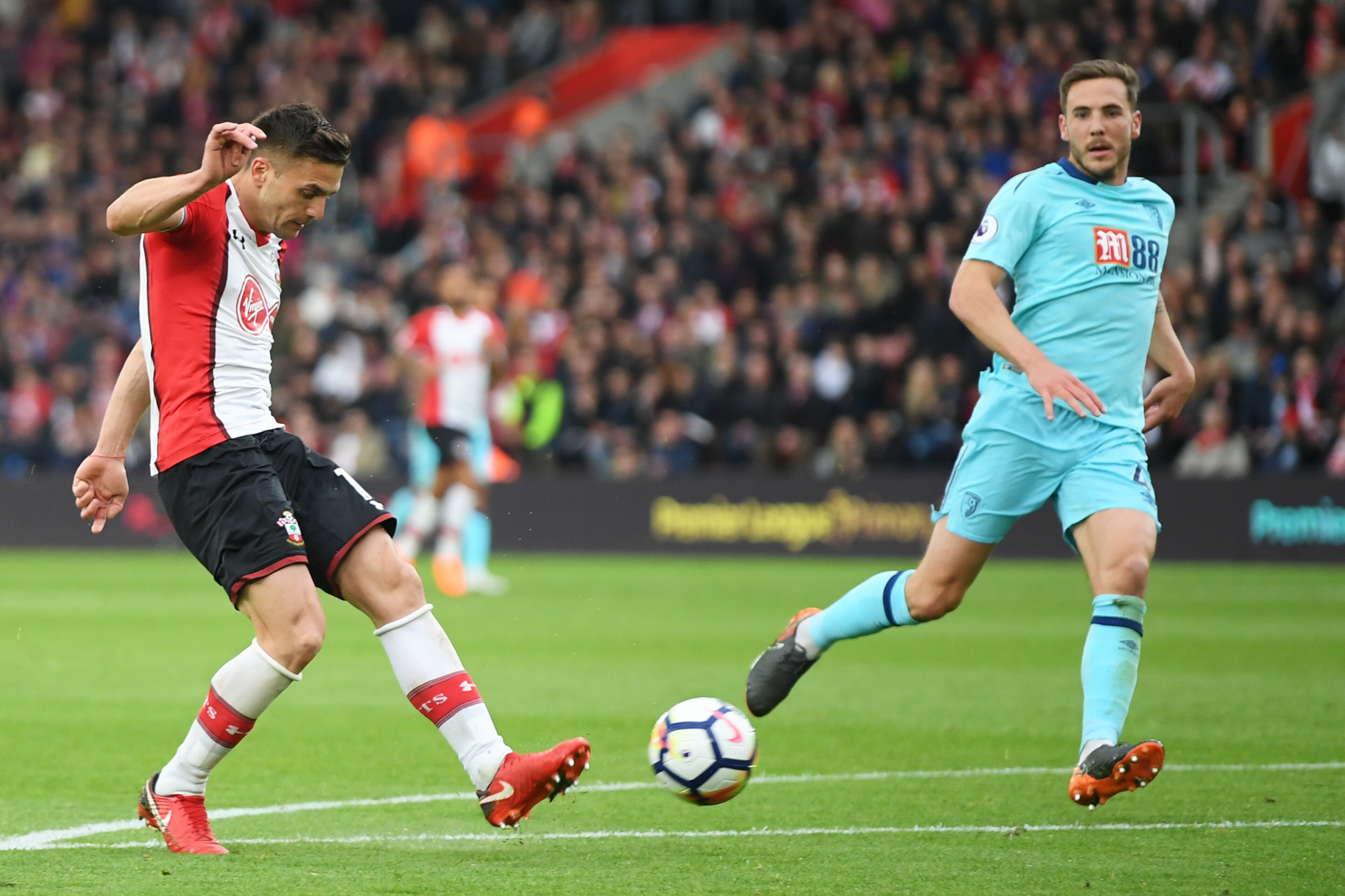 SOUTHAMPTON, ENGLAND - APRIL 28:  Dusan Tadic of Southampton shoots and scores his side's second goal during the Premier League match between Southampton and AFC Bournemouth at St Mary's Stadium on April 28, 2018 in Southampton, England.  (Photo by Mike H
