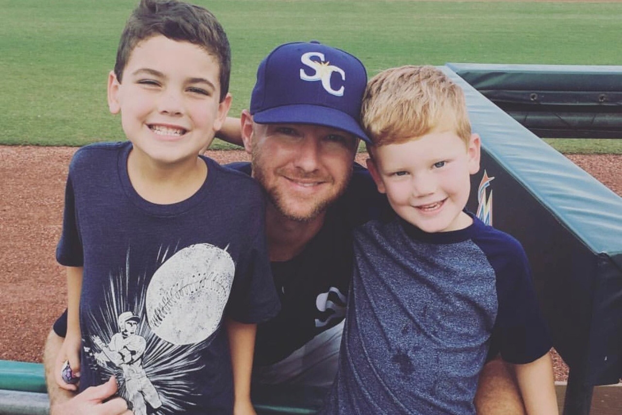 Jonny Venters with sons Wyatt, left, and Walker, right