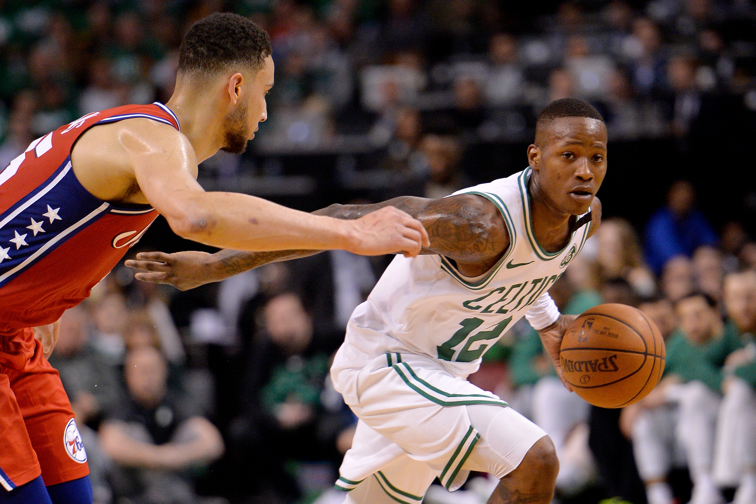 BOSTON, MA - APRIL 28: Terry Rozier #12 of the Boston Celtics handles the ball against the Philadelphia 76ers during Game One of the Eastern Conference Semifinals of the 2018 NBA Playoffs on April 30, 2018 at the TD Garden in Boston, Massachusetts. NOTE T