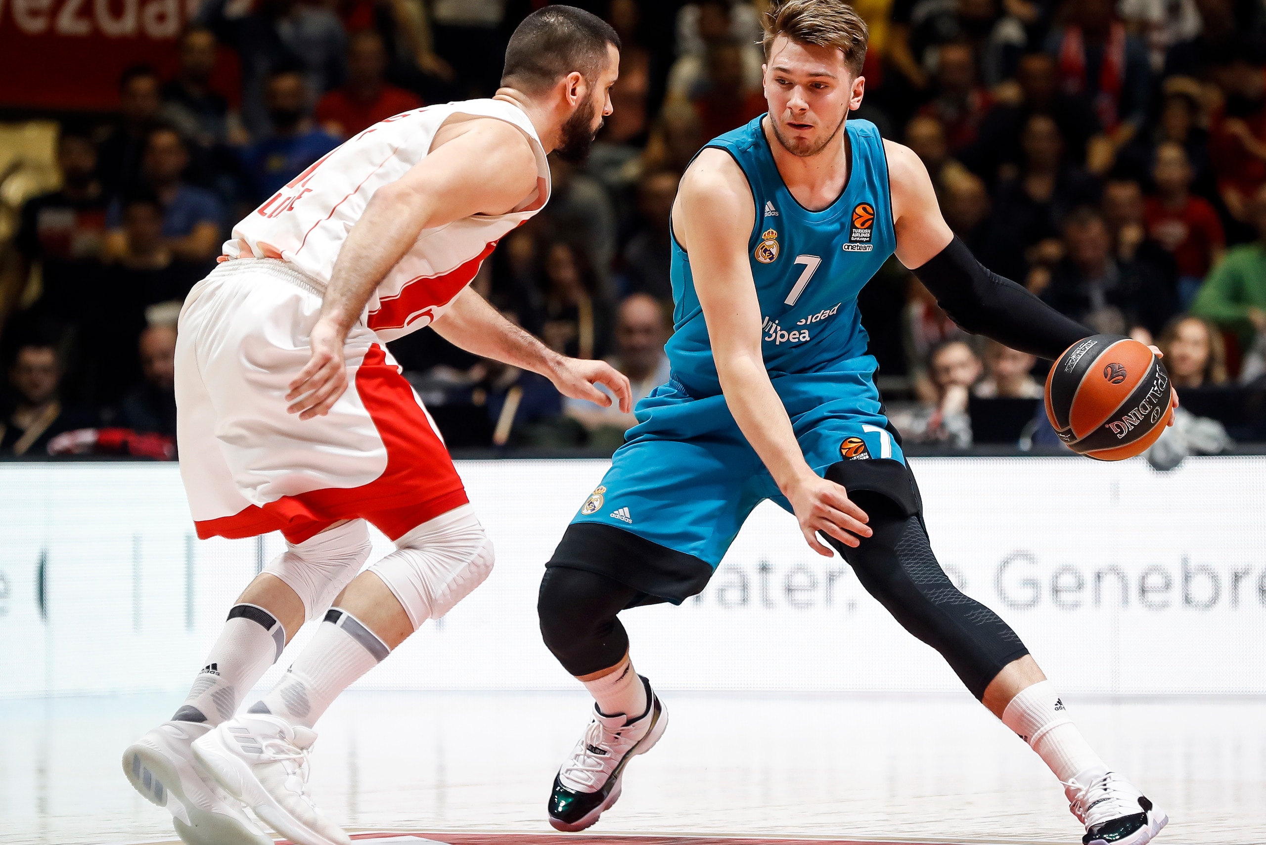 BELGRADE, SERBIA - MARCH 30: Luka Doncic (R) of Real Madrid in action against Branko Lazic (L) of Crvena Zvezda during the 2017/2018 Turkish Airlines EuroLeague Regular Season game between Crvena Zvezda mts Belgrade and Real Madrid at Aleksandar Nikolic H BELGRADE, SERBIA - MARCH 30: Luka Doncic (R) of Real Madrid in action against Branko Lazic (L) of Crvena Zvezda during the 2017/2018 Turkish Airlines EuroLeague Regular Season game between Crvena Zvezda mts Belgrade and Real Madrid at Aleksandar Nikolic H