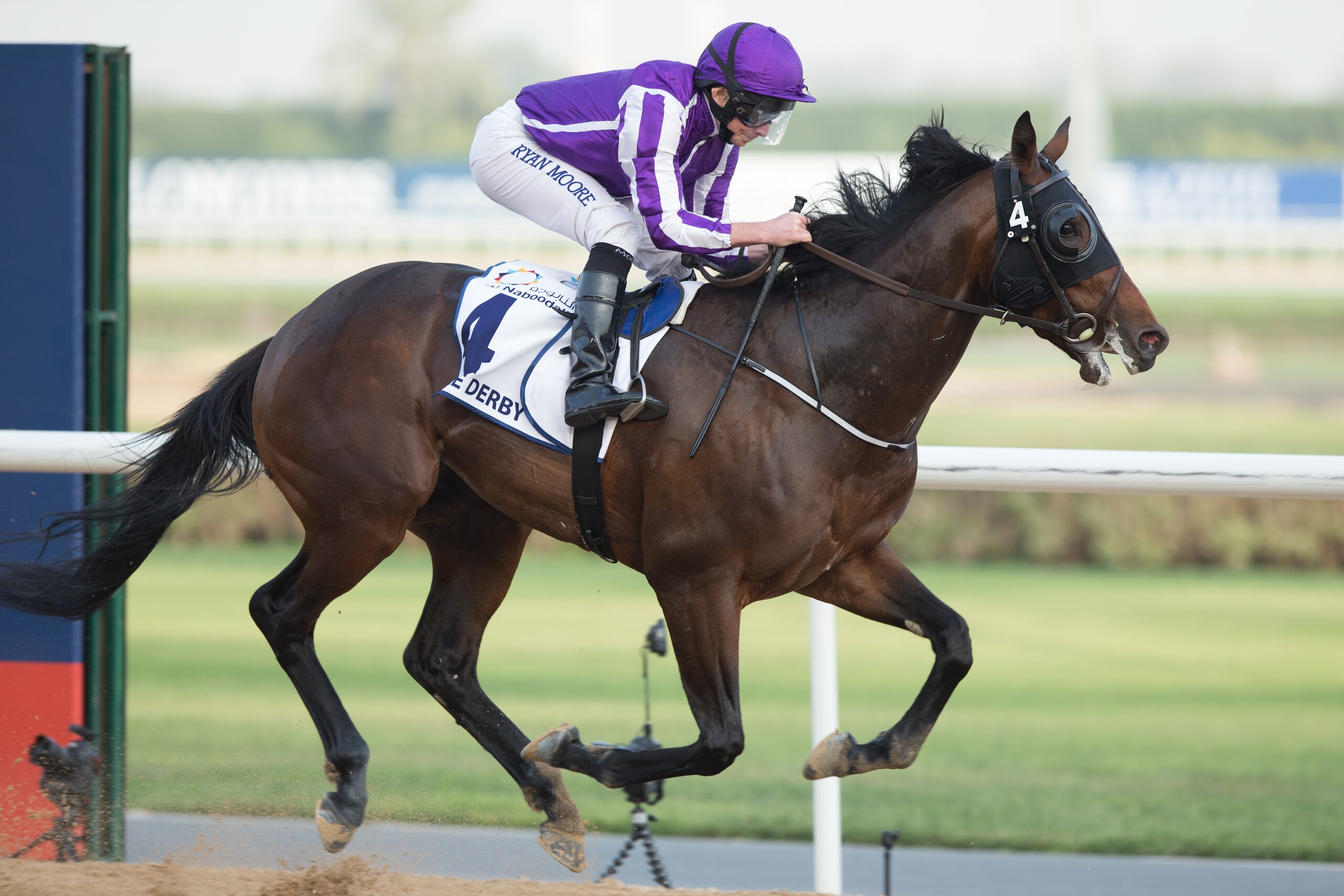DUBAI, UNITED ARAB EMIRATES - MARCH 31: Ryan Moore riding Mendelssohn wins the UAE Derby during the Dubai World Cup Day at Meydan Racecourse on March 31, 2018 in Dubai, United Arab Emirates.