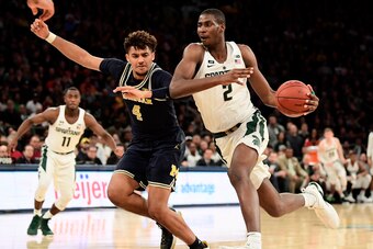 NEW YORK, NY - MARCH 03:  Jaren Jackson Jr. #2 of the Michigan State Spartans is defended by Isaiah Livers #4 of the Michigan Wolverines during the semifinals of the Big Ten Basketball Tournament at Madison Square Garden on March 3, 2018 in New York City.
