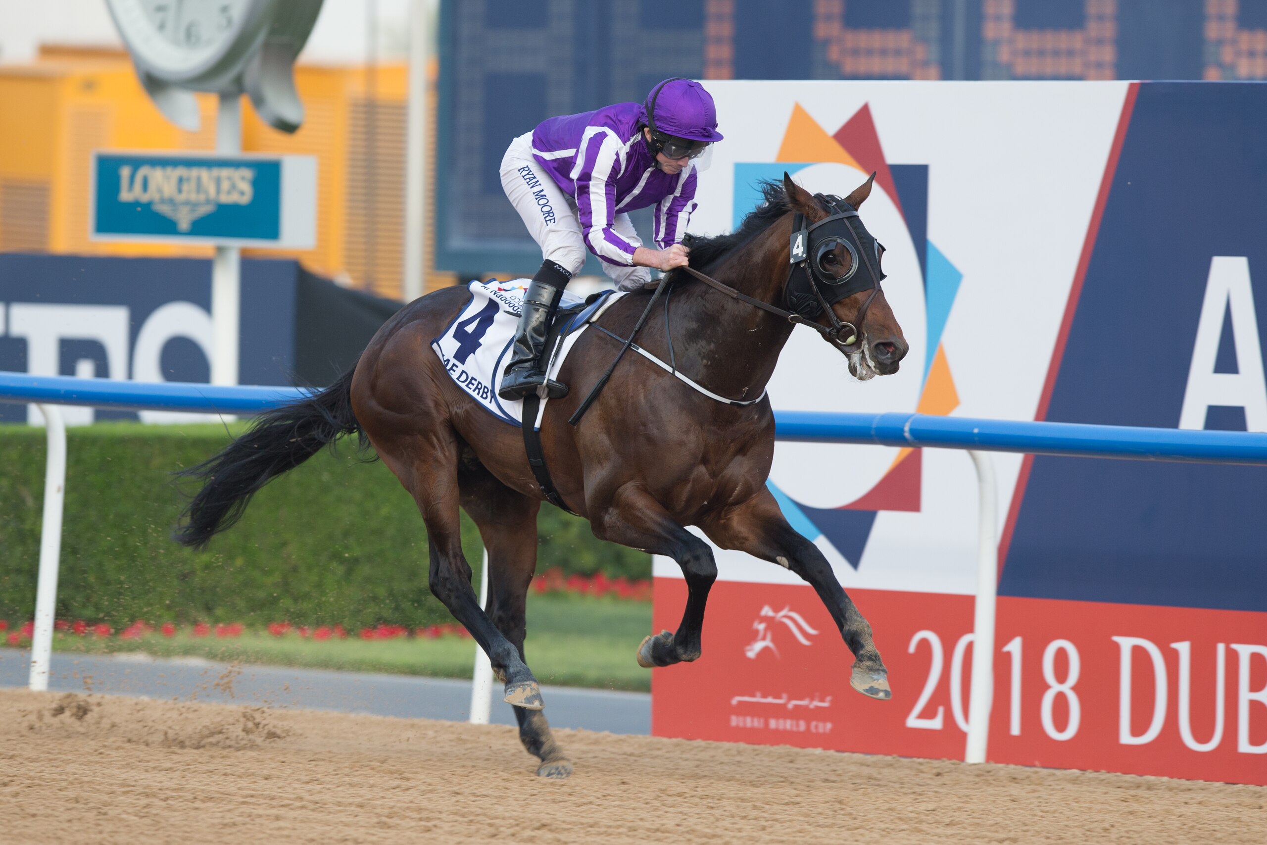 DUBAI, UNITED ARAB EMIRATES - MARCH 31: Ryan Moore riding Mendelssohn wins the UAE Derby during the Dubai World Cup Day at Meydan Racecourse on March 31, 2018 in Dubai, United Arab Emirates.