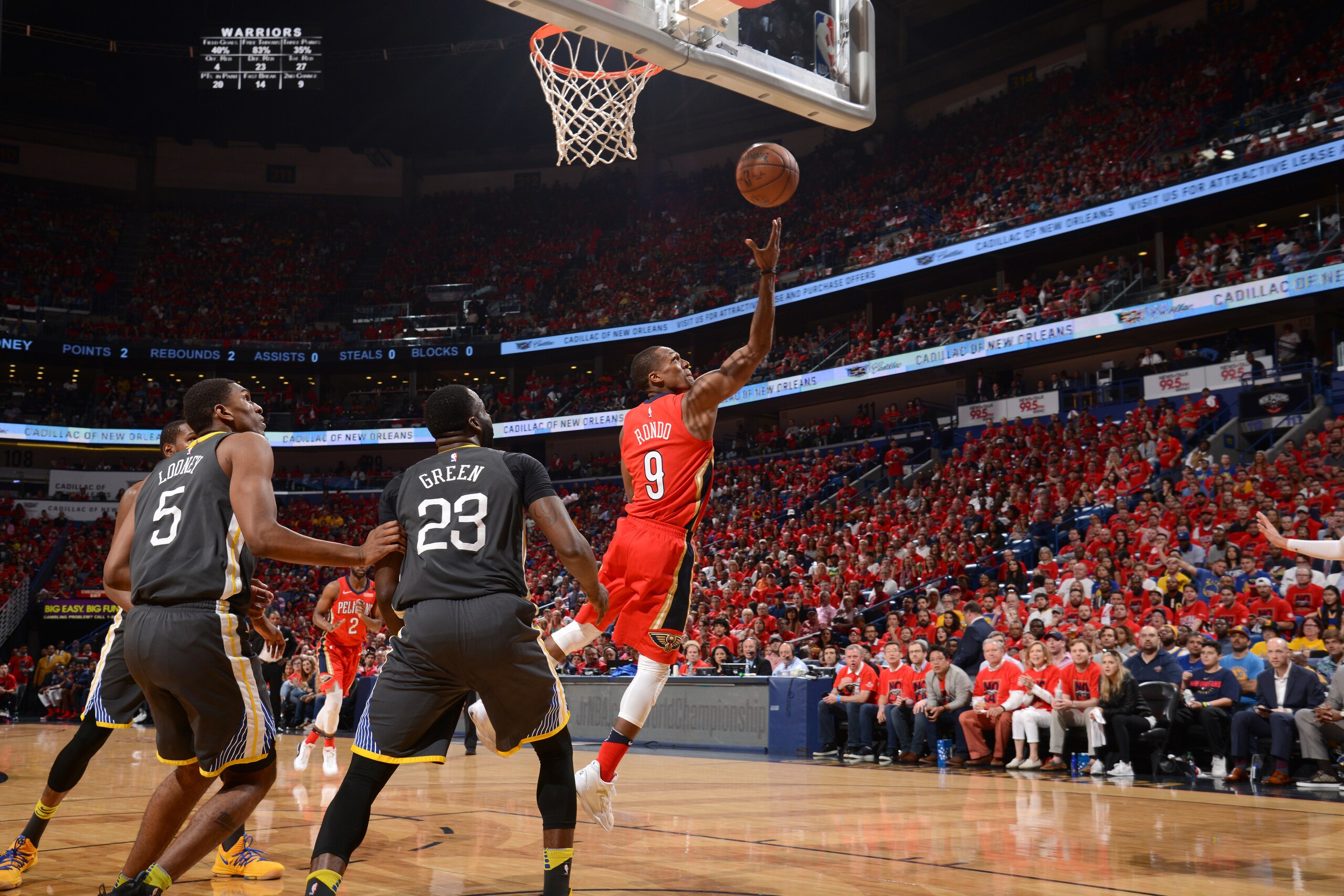 NEW ORLEANS, LA - MAY 4: Rajon Rondo #9 of the New Orleans Pelicans goes to the basket against the Golden State Warriors in Game Three of the Western Conference Semifinals during the 2018 NBA Playoffs on May 4, 2018 at Smoothie King Center in New Orleans,