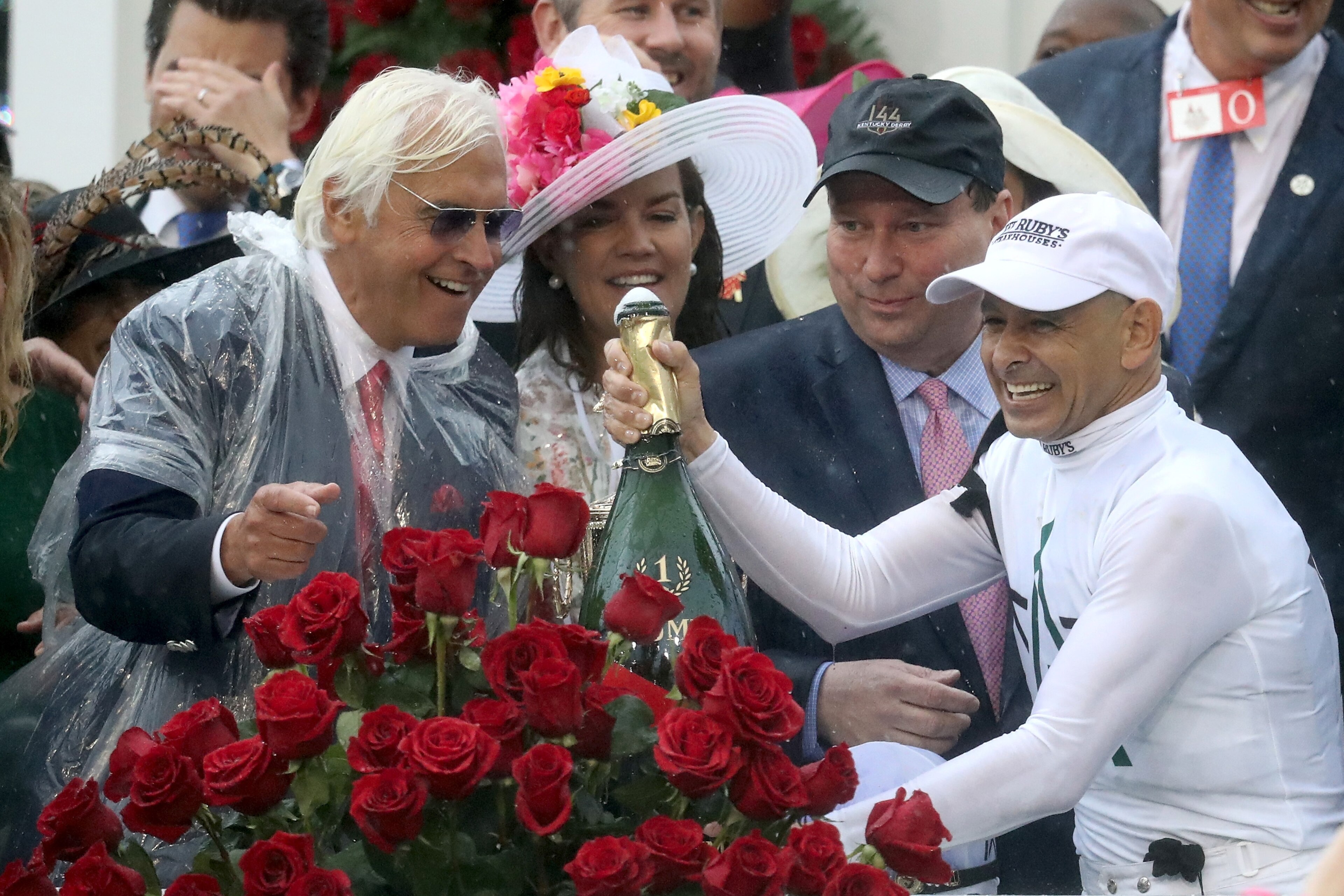 LOUISVILLE, KY - MAY 05: Jockey Mike Smith celebrates with trainer Bob Baffert after winning the 144th running of the Kentucky Derby at Churchill Downs on May 5, 2018 in Louisville, Kentucky. (Photo by Rob Carr/Getty Images) LOUISVILLE, KY - MAY 05: Jockey Mike Smith celebrates with trainer Bob Baffert after winning the 144th running of the Kentucky Derby at Churchill Downs on May 5, 2018 in Louisville, Kentucky. (Photo by Rob Carr/Getty Images)