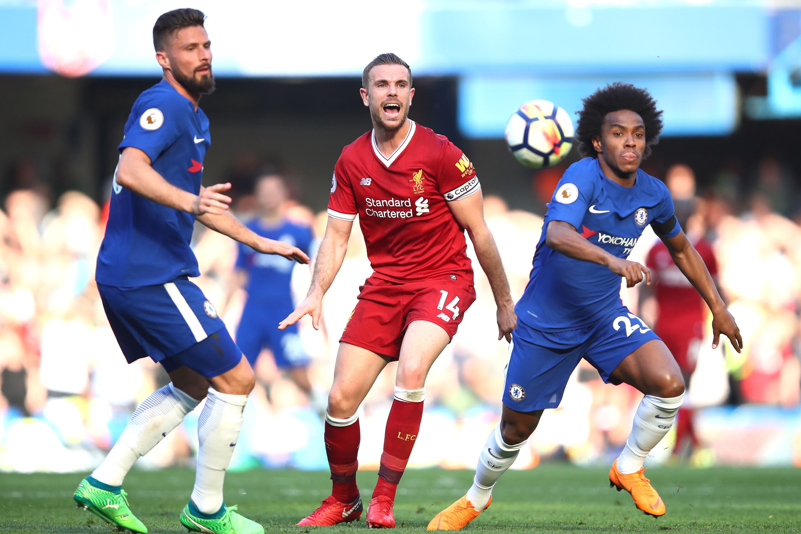 LONDON, ENGLAND - MAY 06:  Olivier Giroud of Chelsea , Jordan Henderson of Liverpool and Willian of Chelsea in action during the Premier League match between Chelsea and Liverpool at Stamford Bridge on May 6, 2018 in London, England.  (Photo by Julian Fin