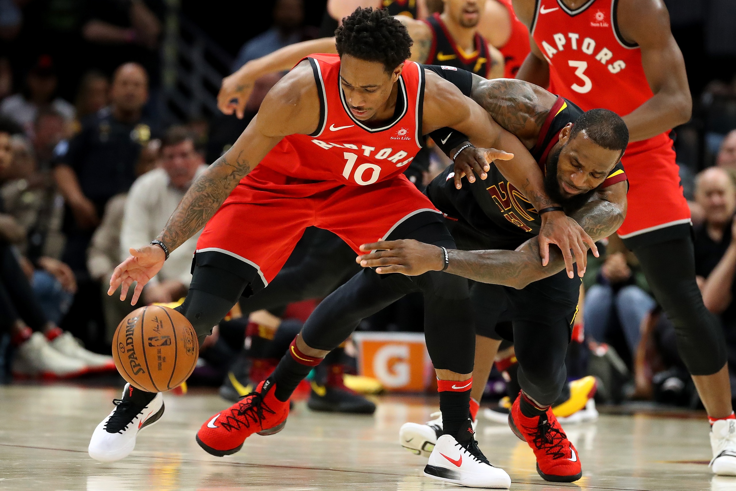 CLEVELAND, OH - MAY 05:  LeBron James #23 of the Cleveland Cavaliers battles with DeMar DeRozan #10 of the Toronto Raptors during the second half in Game Three of the Eastern Conference Semifinals during the 2018 NBA Playoffs at Quicken Loans Arena on May