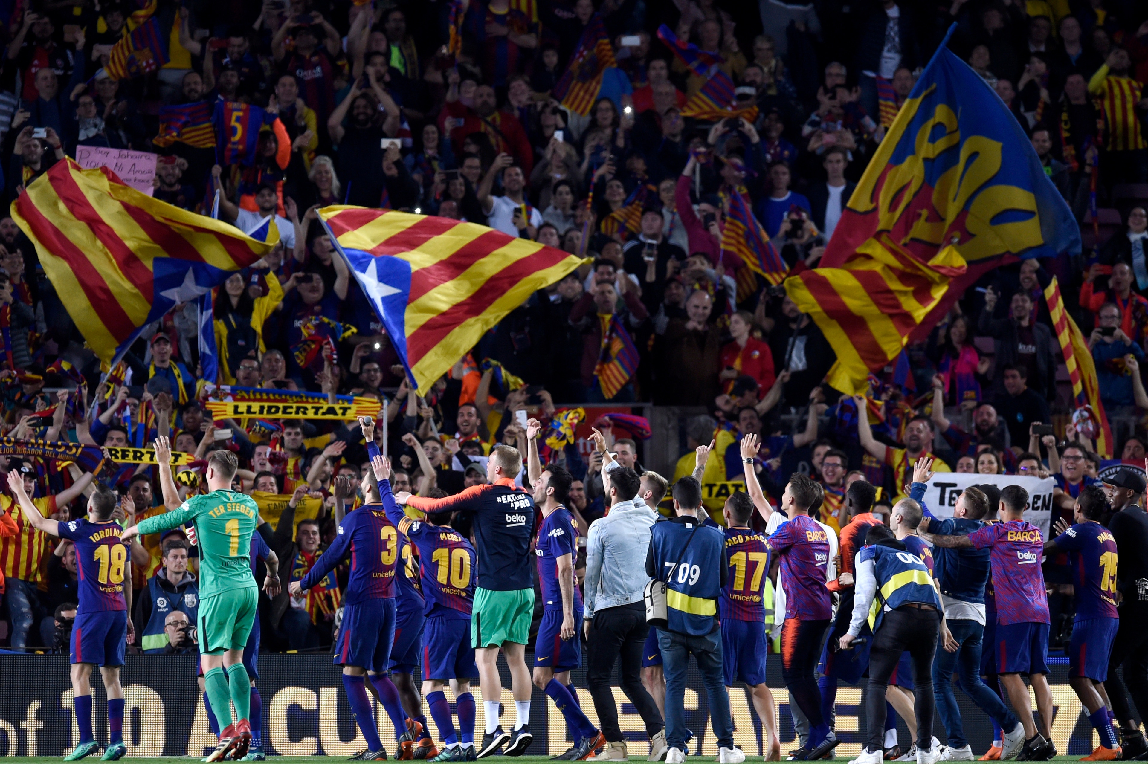 BARCELONA, SPAIN - MAY 06:  Barcelon players celebrate with fans after the La Liga match between Barcelona and Real Madrid at Camp Nou on May 6, 2018 in Barcelona, Spain.  (Photo by Alex Caparros/Getty Images)
