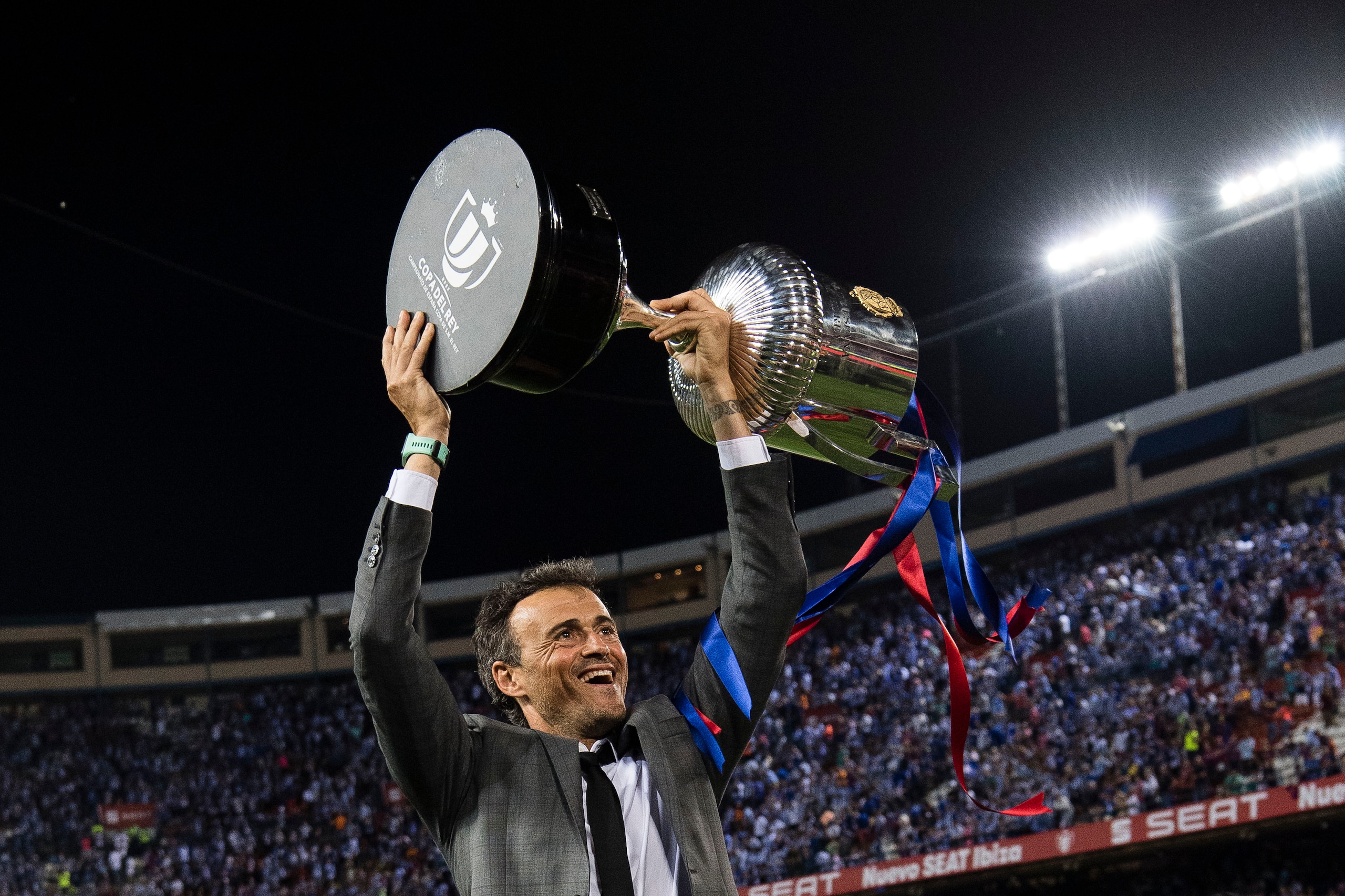 MADRID, SPAIN - MAY 27: Coach Luis Enrique Martinez Garcia of FC Barcelona poses for photos with the trophy after winning the Copa Del Rey Final between FC Barcelona and Deportivo Alaves at Vicente Calderon Stadium on May 27, 2017 in Madrid, Spain. (Photo