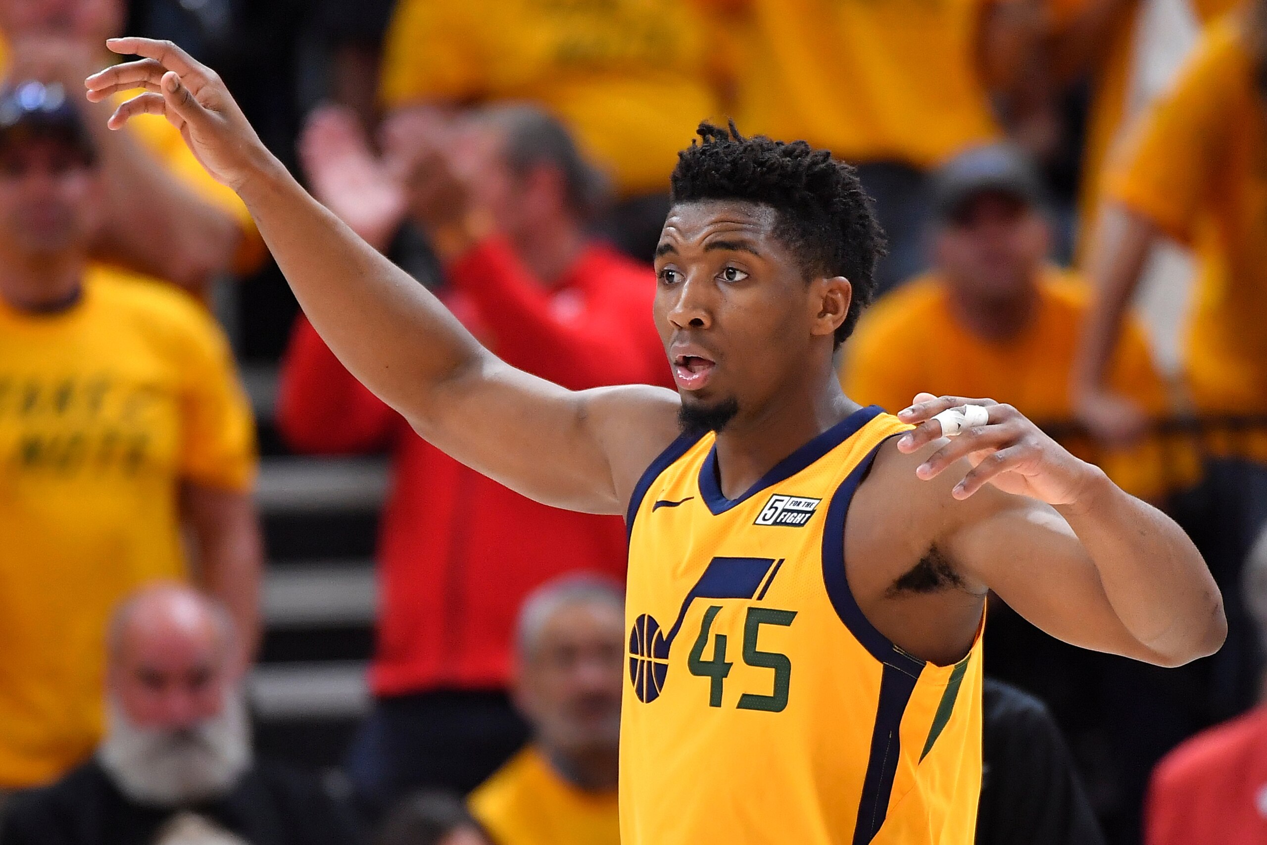 SALT LAKE CITY, UT - MAY 06: Donovan Mitchell #45 of the Utah Jazz reacts to a call in the second half during Game Four of Round Two of the 2018 NBA Playoffs against the Houston Rockets at Vivint Smart Home Arena on May 6, 2018 in Salt Lake City, Utah. Th
