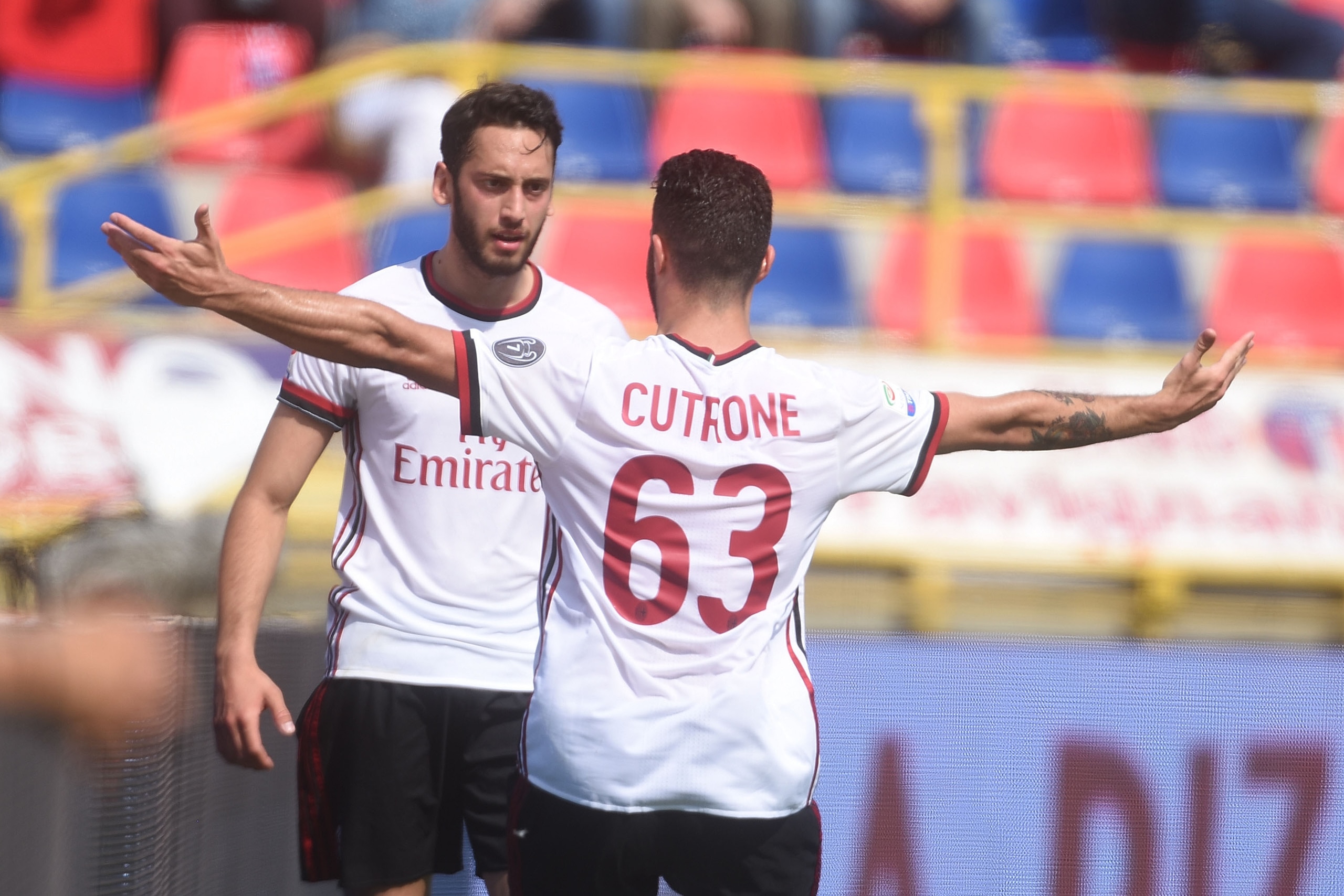 BOLOGNA, ITALY - APRIL 29:  Hakan  Calhanoglu of AC Milan celebrates after scoring the opening goal during the serie A match between Bologna FC and AC Milan at Stadio Renato Dall'Ara on April 29, 2018 in Bologna, Italy.  (Photo by Mario Carlini / Iguana P