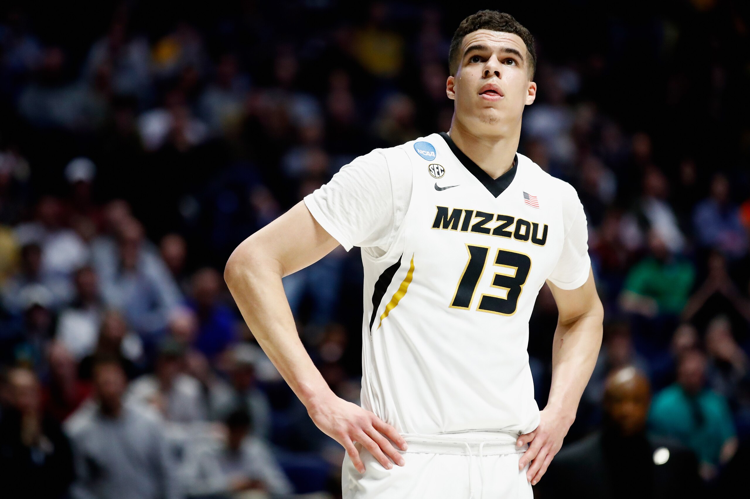 NASHVILLE, TN - MARCH 16:  Michael Porter Jr. #13 of the Missouri Tigers looks on against the Florida State Seminoles during the game in the first round of the 2018 NCAA Men's Basketball Tournament at Bridgestone Arena on March 16, 2018 in Nashville, Tenn