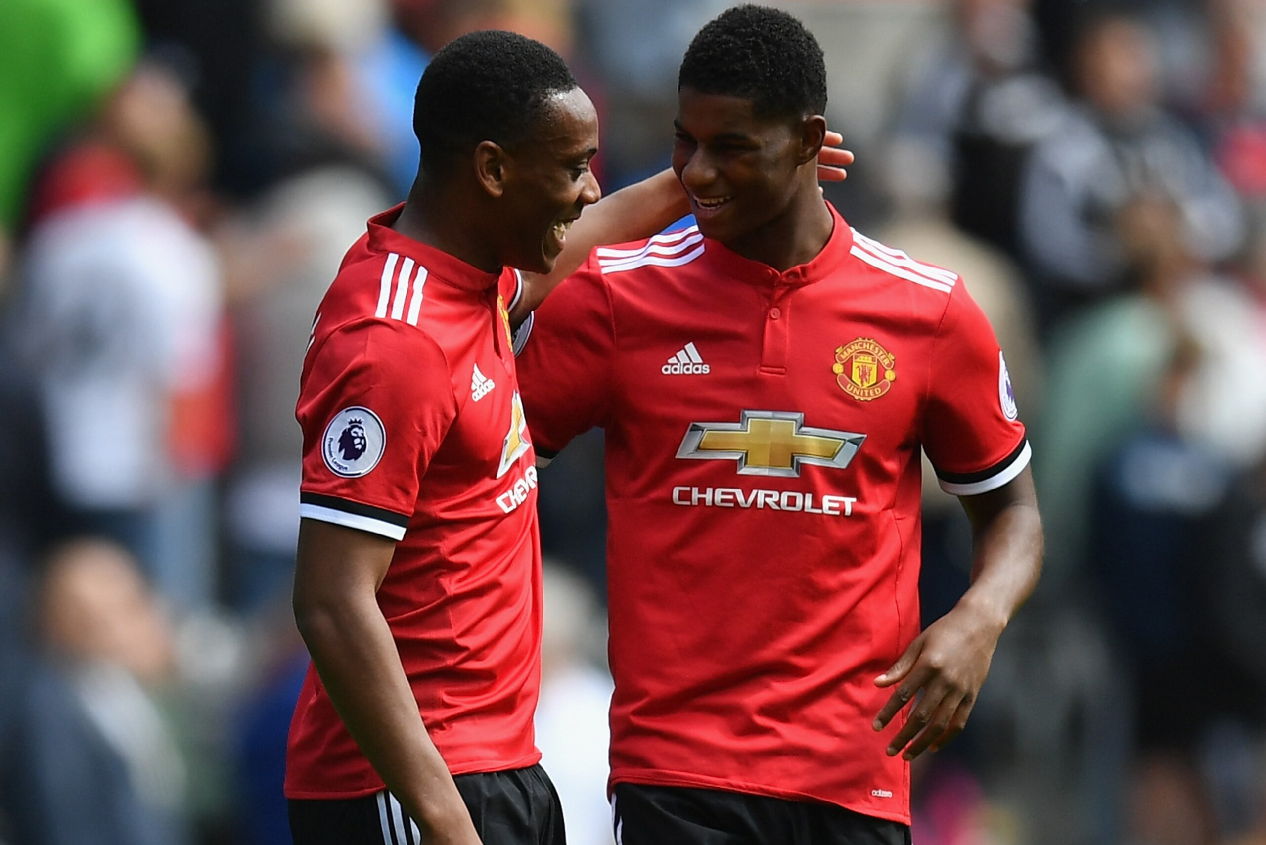 SWANSEA, WALES - AUGUST 19: Anthony Martial of Manchester United and Marcus Rashford of Manchester United celebrate victory after the Premier League match between Swansea City and Manchester United at Liberty Stadium on August 19, 2017 in Swansea, Wales. 