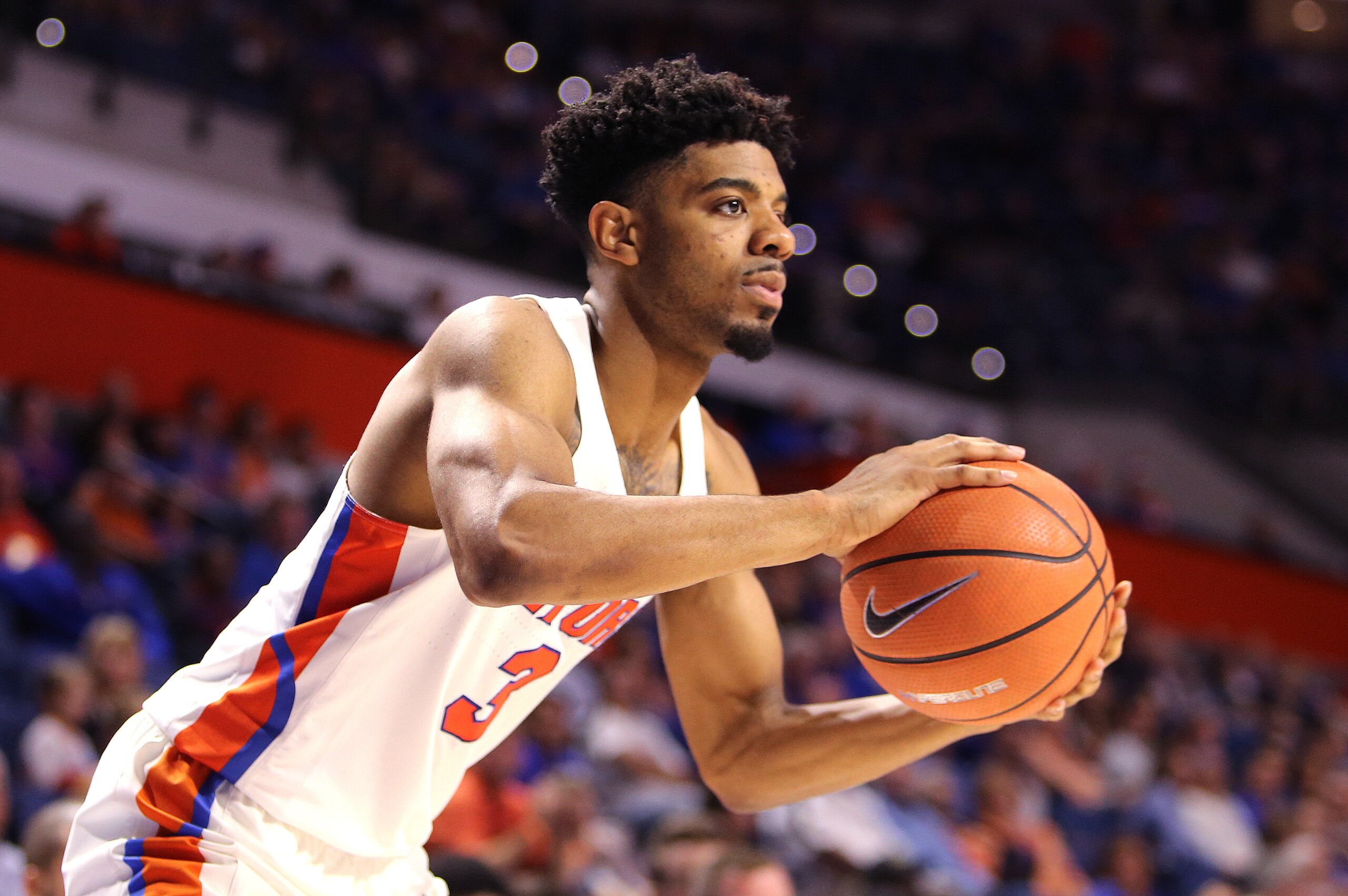 GAINESVILLE, FL - DECEMBER 22:  Jalen Hudson #3 of the Florida Gators attempts to pass the ball during a NCAA basketball game against the Incarnate Word Cardinals at the Stephen C. O' Connell Center on December 22, 2017 in Gainesville, Florida. (Photo by 