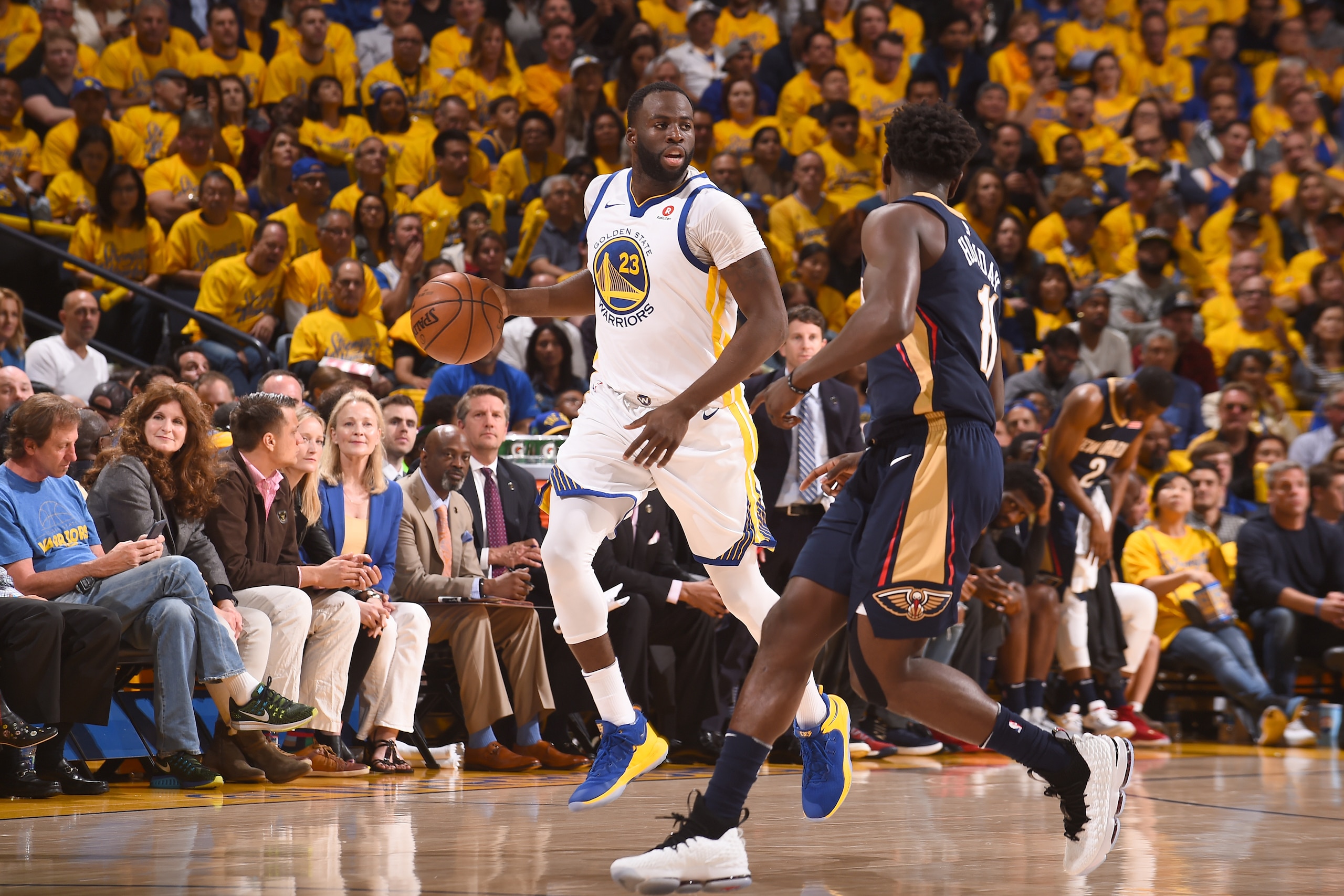 OAKLAND, CA - MAY 8: Draymond Green #23 of the Golden State Warriors handles the ball against the New Orleans Pelicans in Game Five of the Western Conference Semifinals during the 2018 NBA Playoffs on May 8, 2018 at ORACLE Arena in Oakland, California. NO