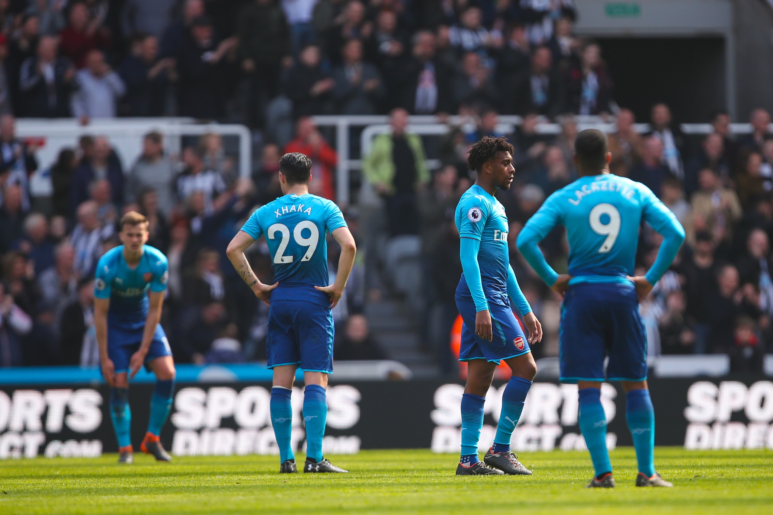 NEWCASTLE UPON TYNE, ENGLAND - APRIL 15: Dejected Arsenal players after conceding the second goal during the Premier League match between Newcastle United and Arsenal at St. James Park on April 15, 2018 in Newcastle upon Tyne, England. (Photo by Robbie Ja