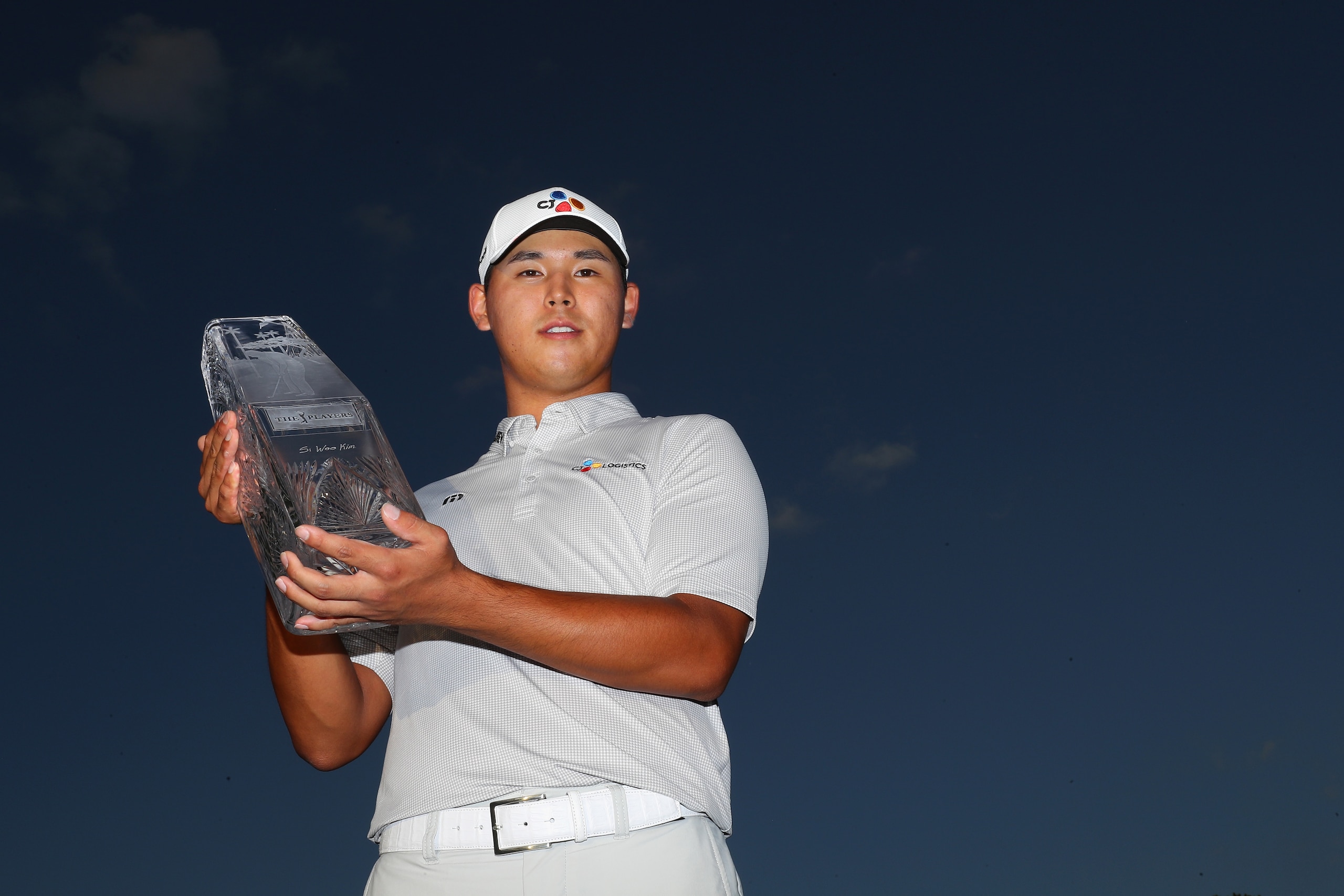 PONTE VEDRA BEACH, FL - MAY 14:  Si Woo Kim of South Korea celebrates with the winner's trophy after the final round of THE PLAYERS Championship at the Stadium course at TPC Sawgrass on May 14, 2017 in Ponte Vedra Beach, Florida.  (Photo by Warren Little/