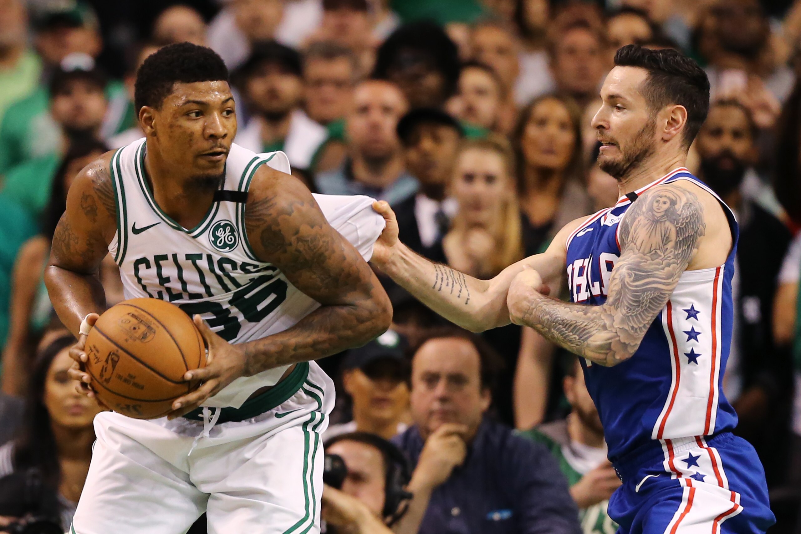 BOSTON, MA - MAY 9: JJ Redick #17 of the Philadelphia 76ers defends Marcus Smart #36 of the Boston Celtics during Game Five of the Eastern Conference Second Round of the 2018 NBA Playoffs at TD Garden on May 9, 2018 in Boston, Massachusetts. The Celtics d