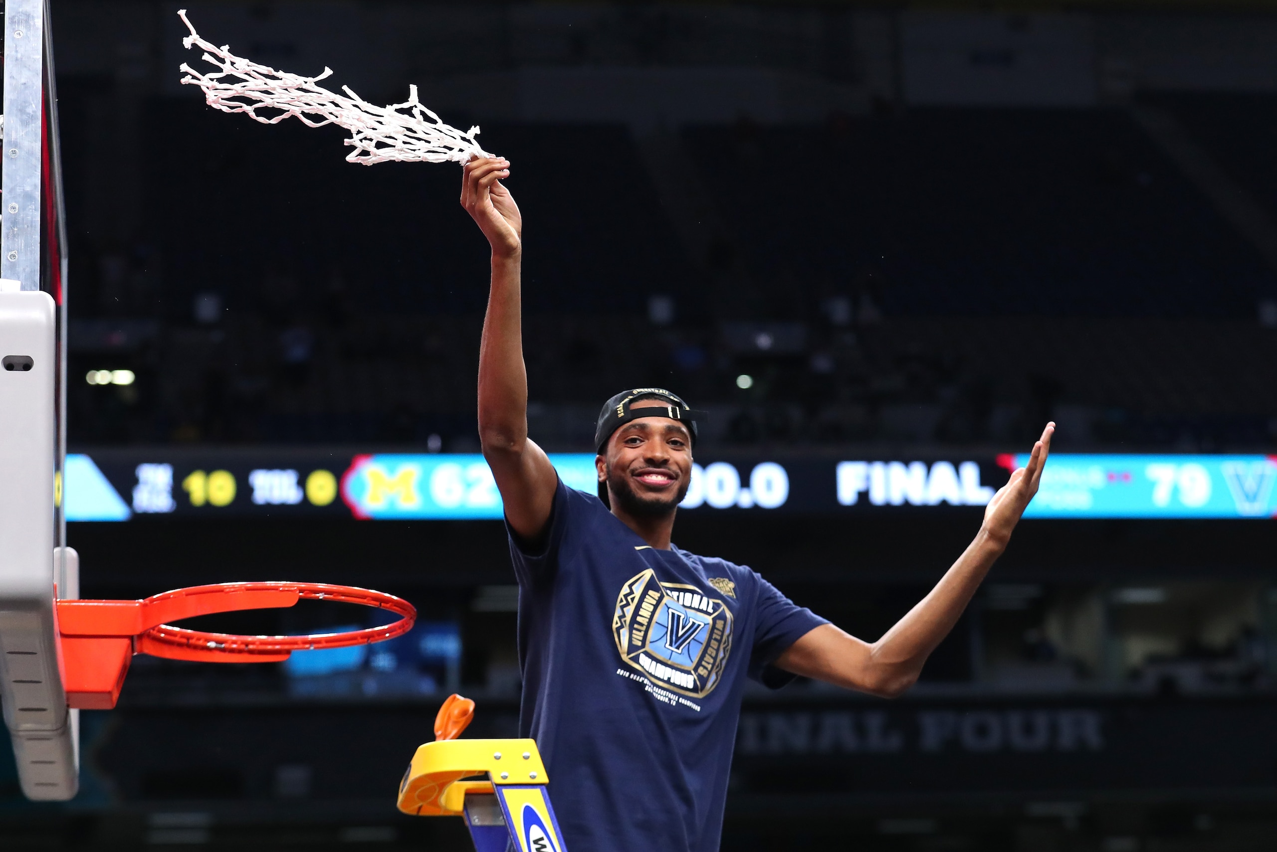 SAN ANTONIO, TX - APRIL 02:  Mikal Bridges #25 of the Villanova Wildcats cuts down the net after defeating the Michigan Wolverines during the 2018 NCAA Men's Final Four National Championship game at the Alamodome on April 2, 2018 in San Antonio, Texas.  V