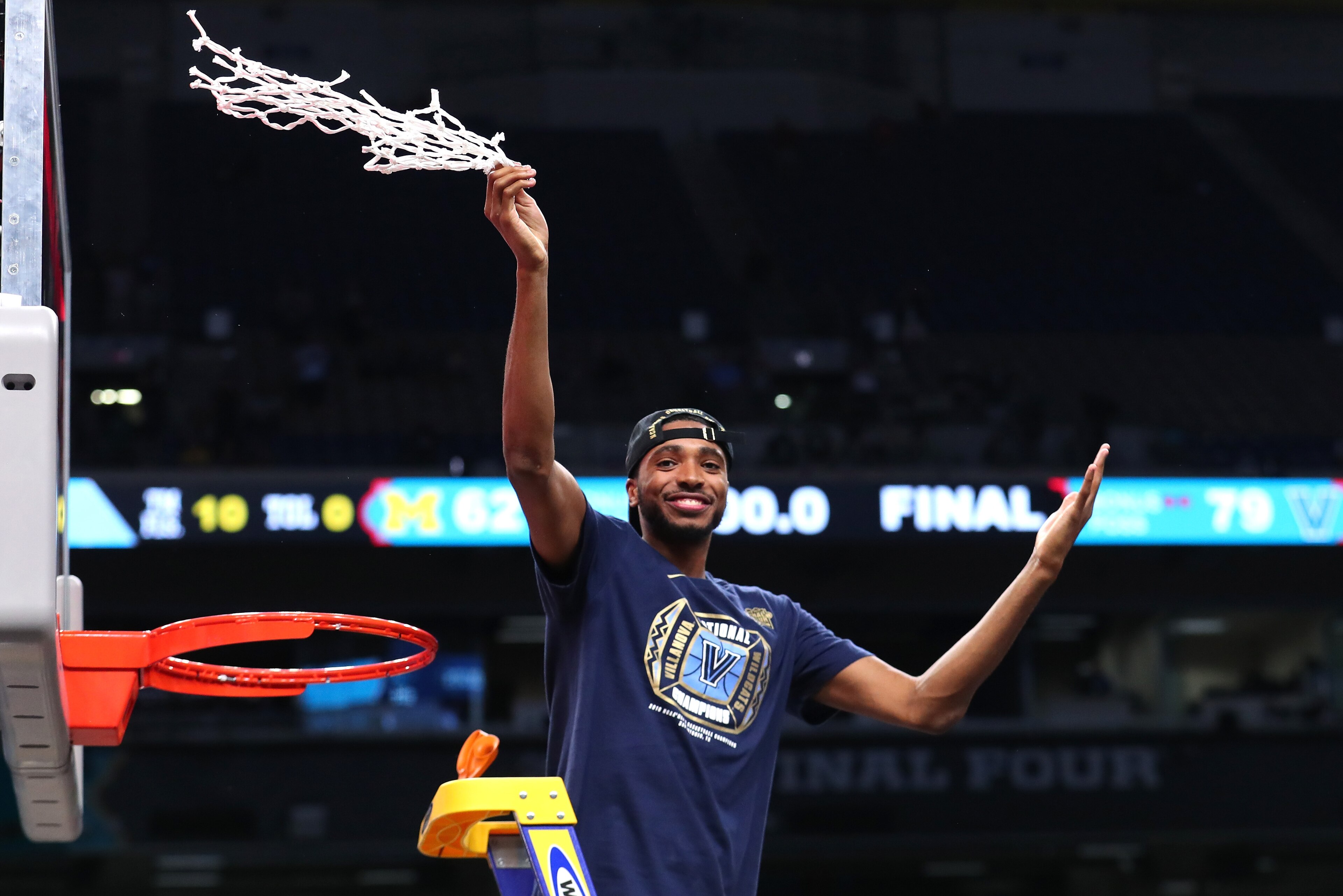 SAN ANTONIO, TX - APRIL 02:  Mikal Bridges #25 of the Villanova Wildcats cuts down the net after defeating the Michigan Wolverines during the 2018 NCAA Men's Final Four National Championship game at the Alamodome on April 2, 2018 in San Antonio, Texas.  V