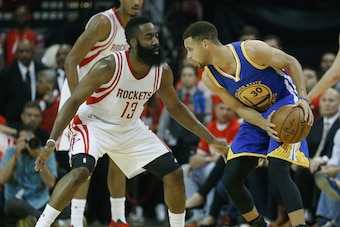 HOUSTON, TX - APRIL 24: Stephen Curry #30 of the Golden State Warriors looks to drive on James Harden #13 of the Houston Rockets at Toyota Center on April 24, 2016 in Houston, Texas. NOTE TO USER: User expressly acknowledges and agrees that, by dowloading