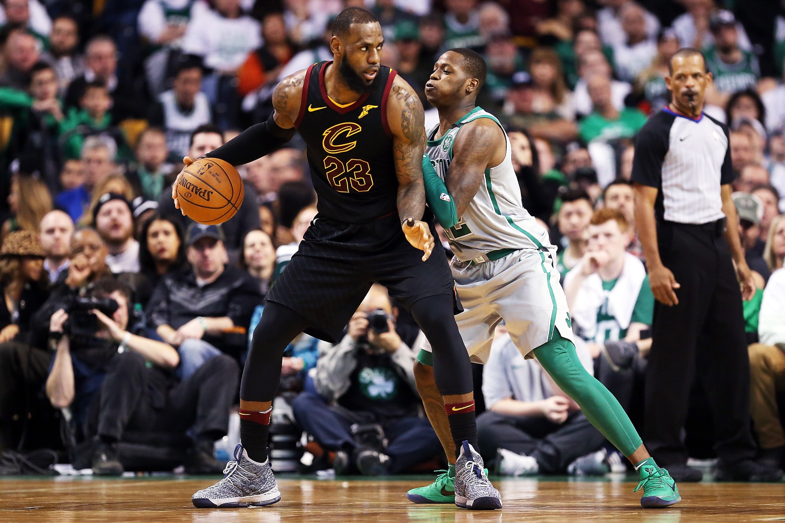 BOSTON, MA - FEBRUARY 11:  Lebron James #23 of the Cleveland Cavaliers is guarded by Terry Rozier #12 of teh Boston Celtics in the second half during a game against the Boston Celtics at TD Garden on February 11, 2018 in Boston, Massachusetts. NOTE TO USE