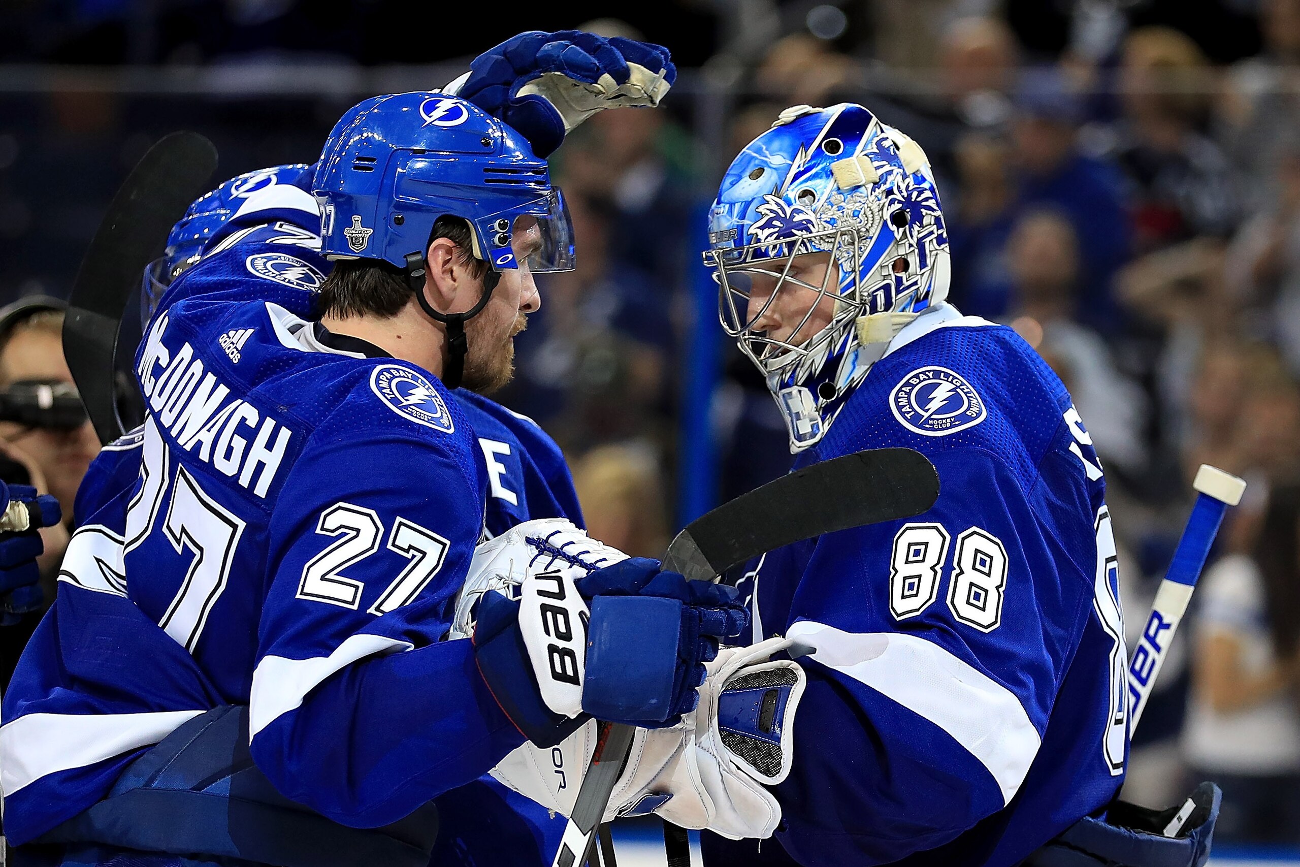 TAMPA, FL - APRIL 30: Ryan McDonagh #27 and Andrei Vasilevskiy #88 of the Tampa Bay Lightning celebrate winning Game Two of the Eastern Conference Second Round against the Boston Bruins during the 2018 NHL Stanley Cup Playoffs at Amalie Arena on April 3 TAMPA, FL - APRIL 30: Ryan McDonagh #27 and Andrei Vasilevskiy #88 of the Tampa Bay Lightning celebrate winning Game Two of the Eastern Conference Second Round against the Boston Bruins during the 2018 NHL Stanley Cup Playoffs at Amalie Arena on April 3
