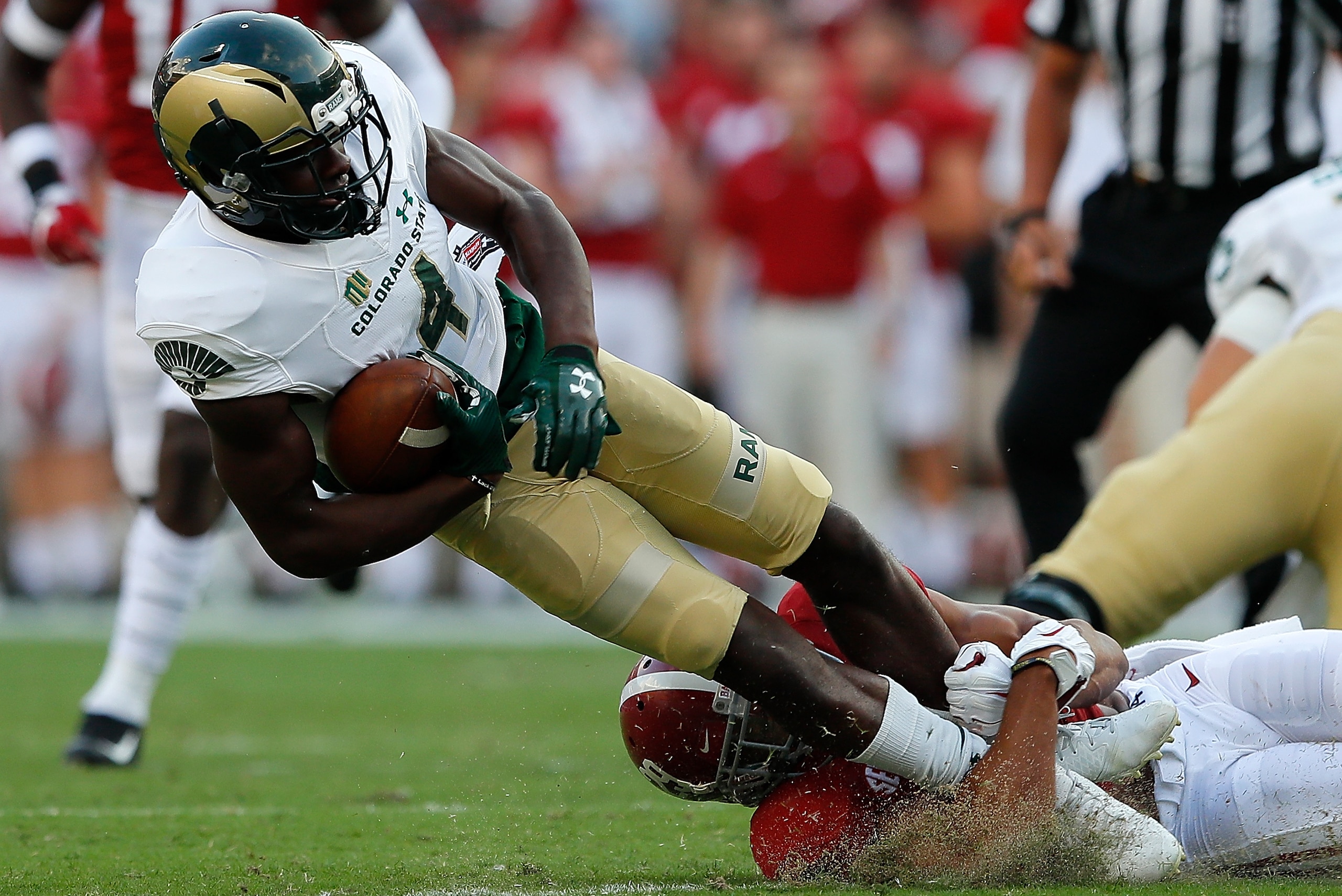 TUSCALOOSA, AL - SEPTEMBER 16:  Minkah Fitzpatrick #29 of the Alabama Crimson Tide tackles Michael Gallup #4 of the Colorado State Rams at Bryant-Denny Stadium on September 16, 2017 in Tuscaloosa, Alabama.  (Photo by Kevin C. Cox/Getty Images)