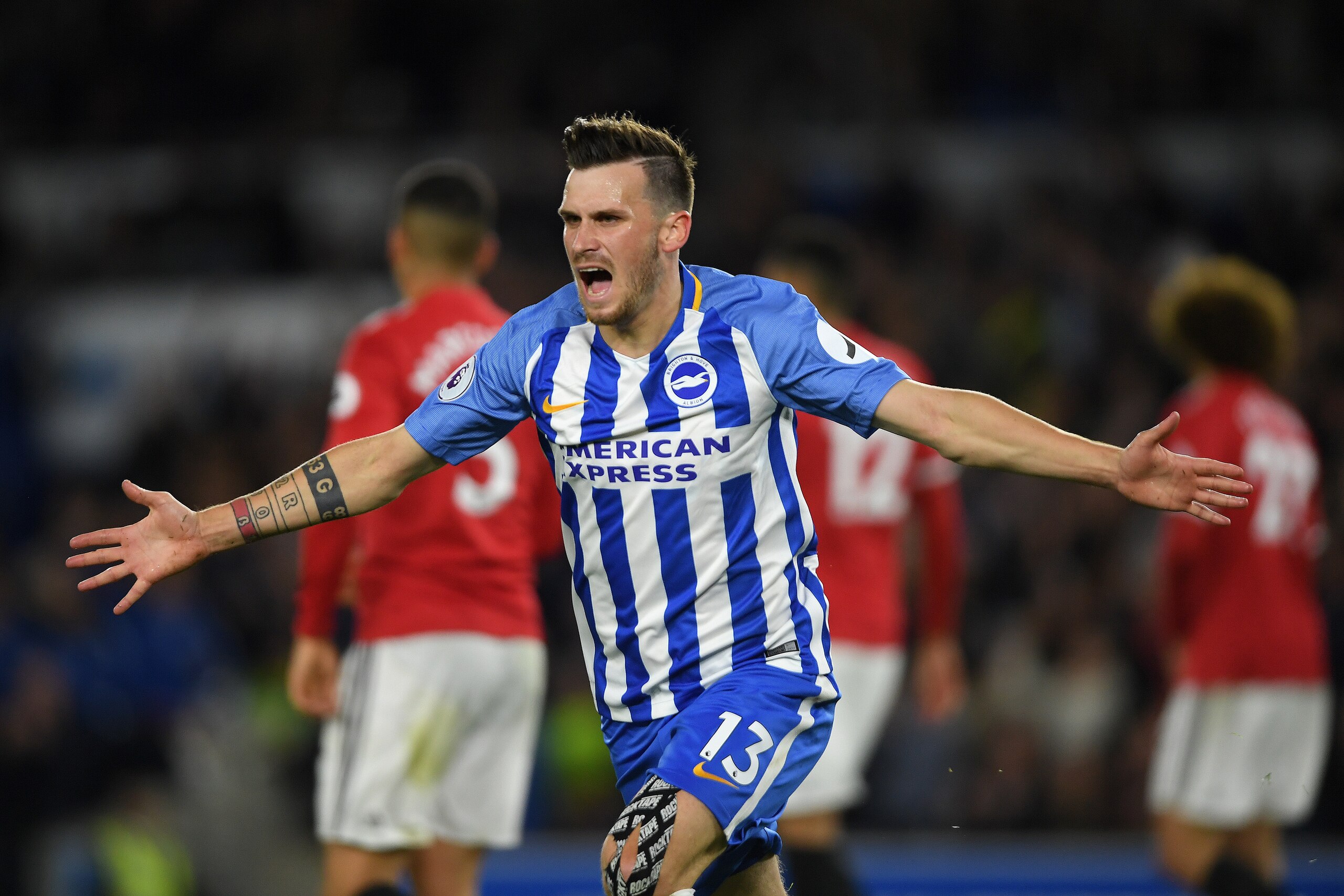 BRIGHTON, ENGLAND - MAY 04:  Pascal Gross of Brighton & Hove Albion celebrates after scoring during the Premier League match between Brighton and Hove Albion and Manchester United at Amex Stadium on May 4, 2018 in Brighton, England.  (Photo by Mike Hewitt