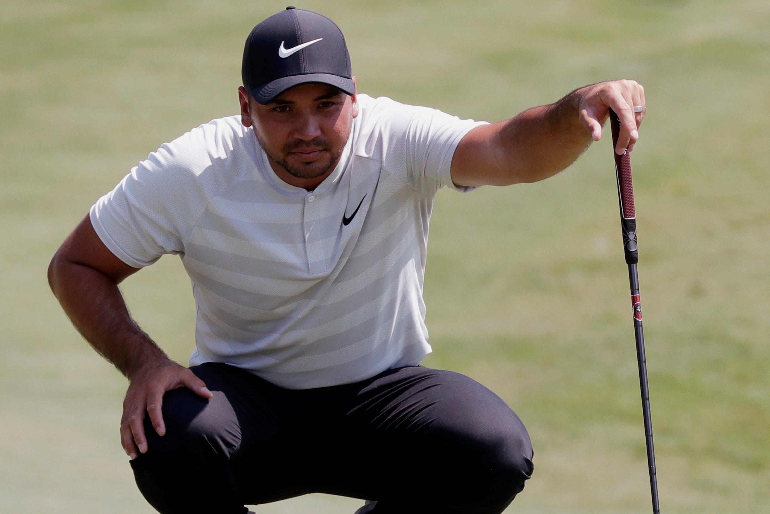 Jason Day hopes to eat into Webb Simpson's lead Saturday.