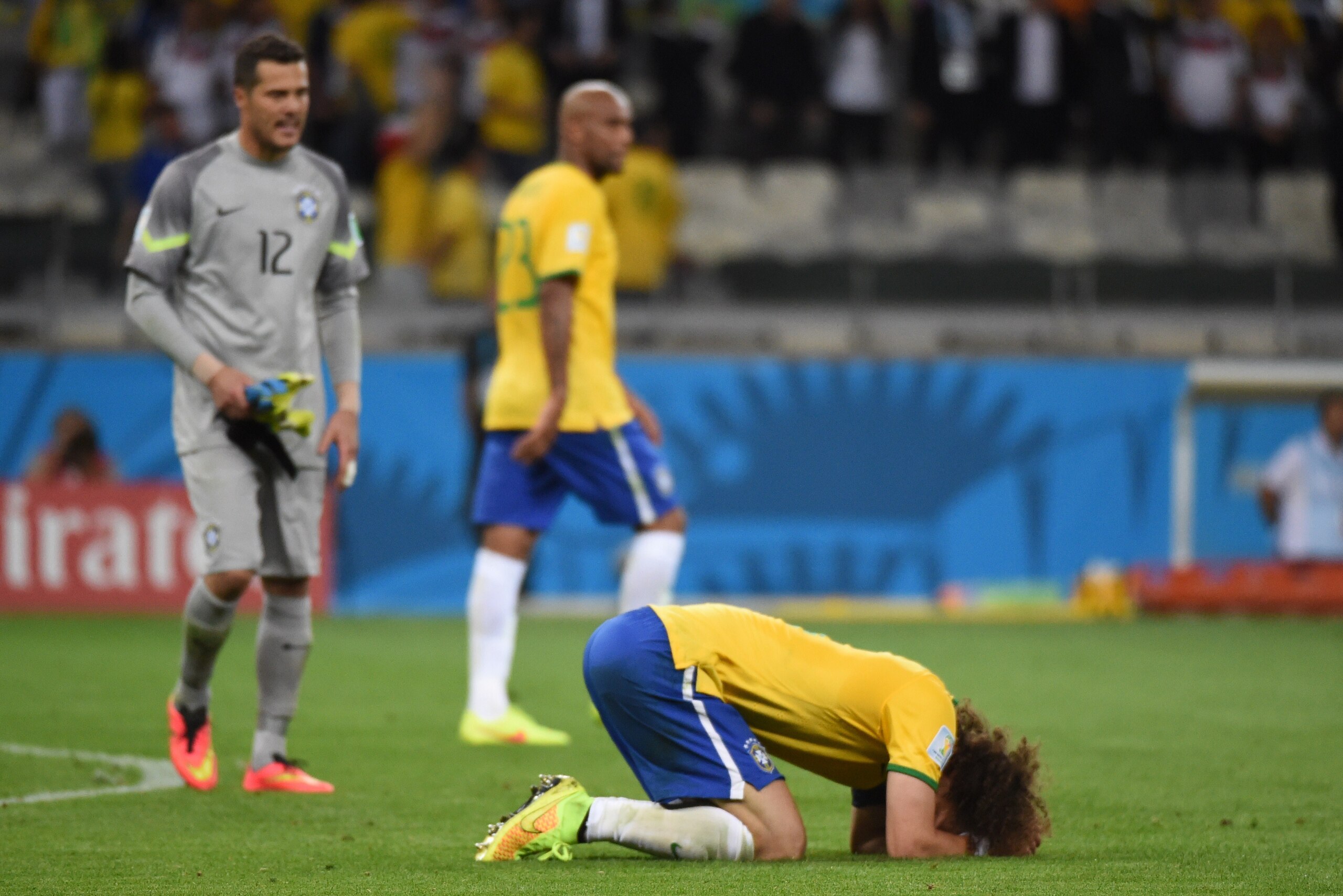 Brazil's defender David Luiz reacts after defeat in the semi-final football match between Brazil and Germany at The Mineirao Stadium in Belo Horizonte on July 8, 2014, during the 2014 FIFA World Cup.  AFP PHOTO / CHRISTOPHE SIMON        (Photo credit shou