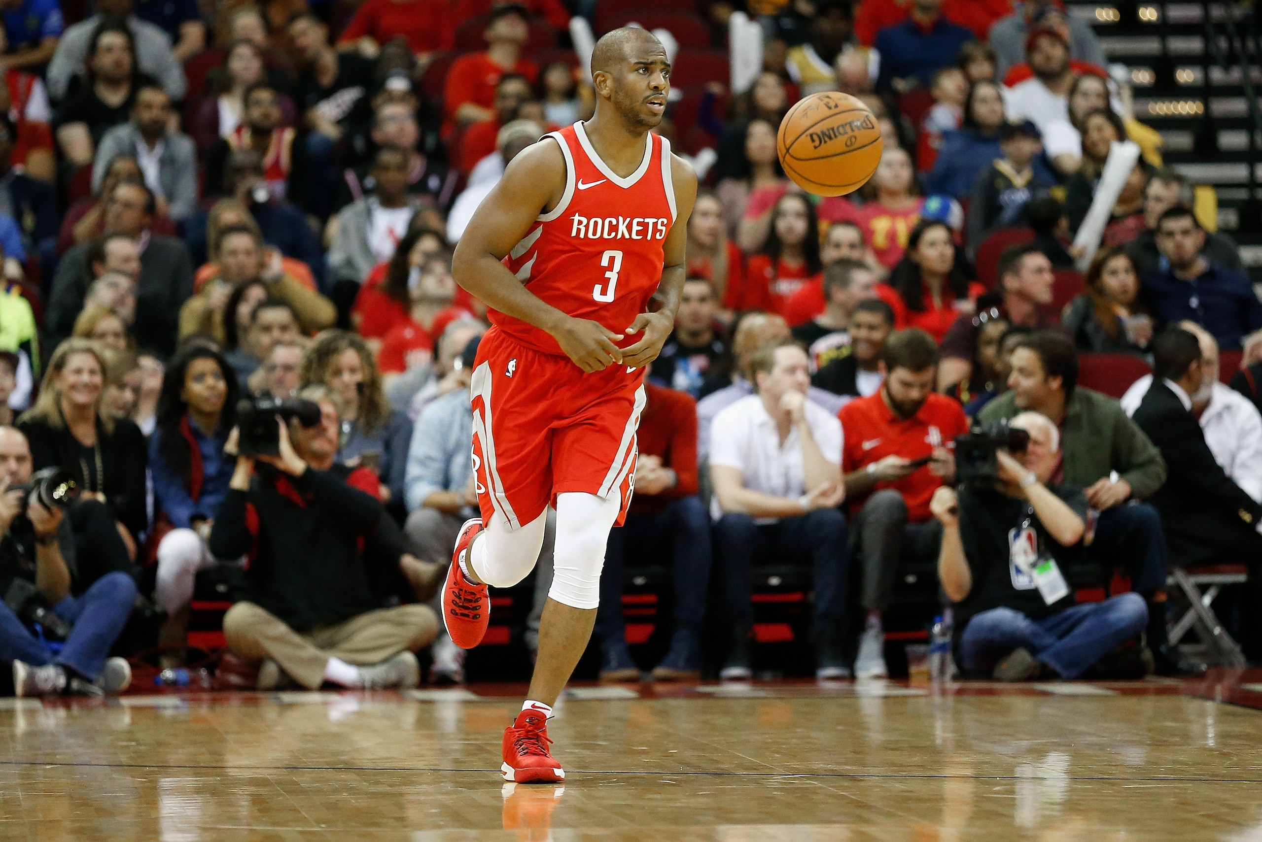 HOUSTON, TX - JANUARY 20: Chris Paul #3 of the Houston Rockets brings the ball up the court against the Golden State Warriors at Toyota Center on January 20, 2018 in Houston, Texas. NOTE TO USER: User expressly acknowledges and agrees that, by downloading HOUSTON, TX - JANUARY 20: Chris Paul #3 of the Houston Rockets brings the ball up the court against the Golden State Warriors at Toyota Center on January 20, 2018 in Houston, Texas. NOTE TO USER: User expressly acknowledges and agrees that, by downloading