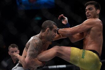 Brazilian fighter Vitor Belfort (L) competes against Brazilian fighter Lyoto Machida (R) during their middleweight bout at the Ultimate Fighting Championship 224 (UFC 224) event at Jeunesse Arena in Rio de Janeiro, Brazil, on May 12, 2018. (Photo by MAURO